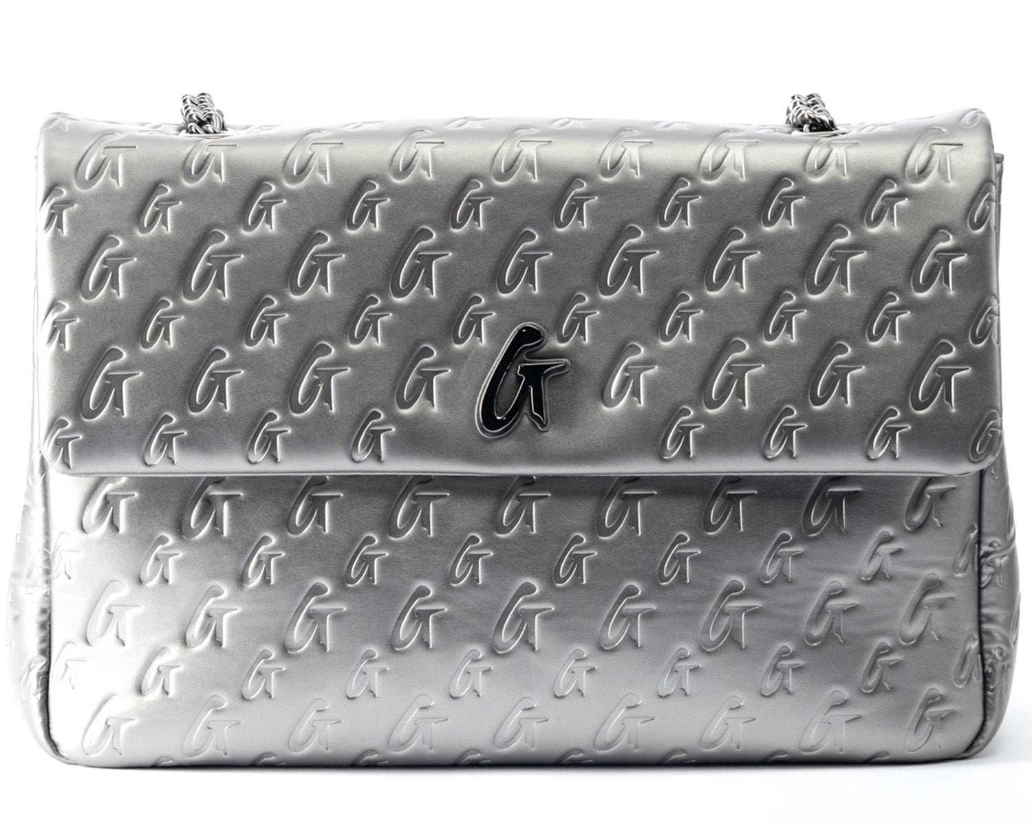 Large platinum-colored Monogram Flap Bag with embossed G logo pattern and chain strap.