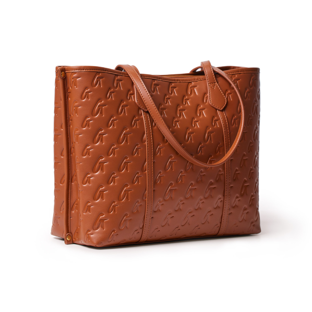 Brown Monogram Sleek Tote bag with embossed logo pattern, dual handles, and a spacious interior.