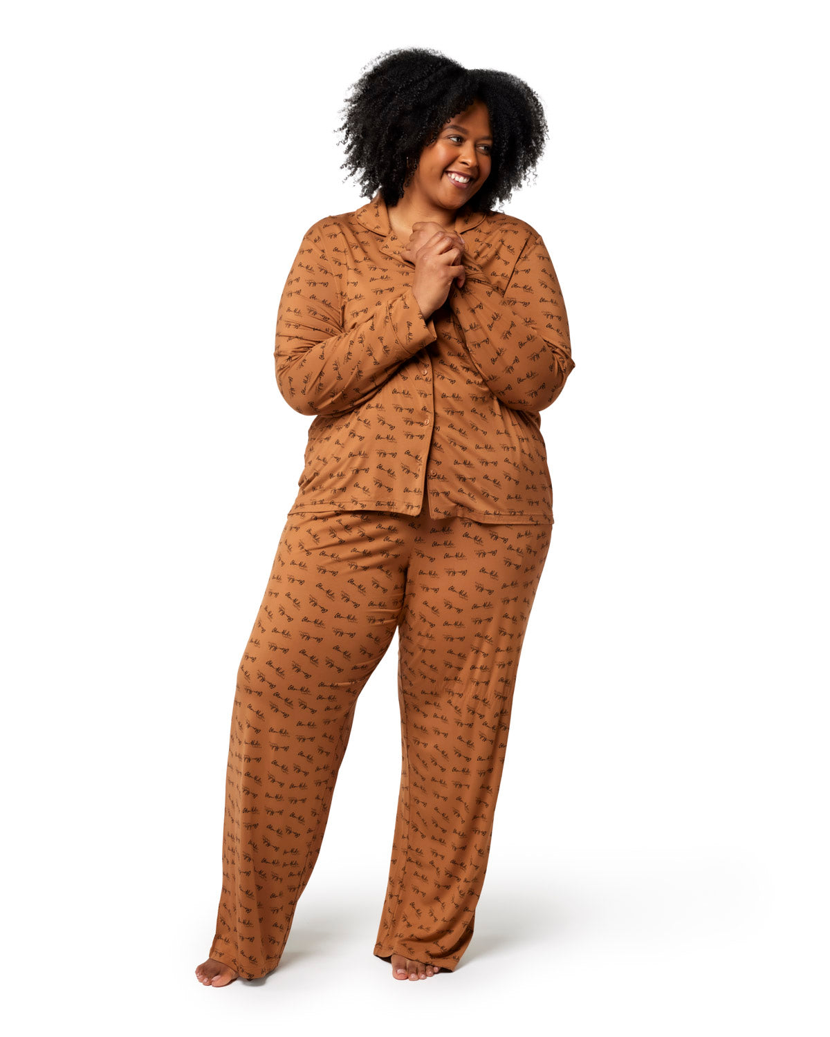 Cozy brown long pajamas featuring a playful print, designed for comfort and style in relaxed fit. Perfect for lounging.