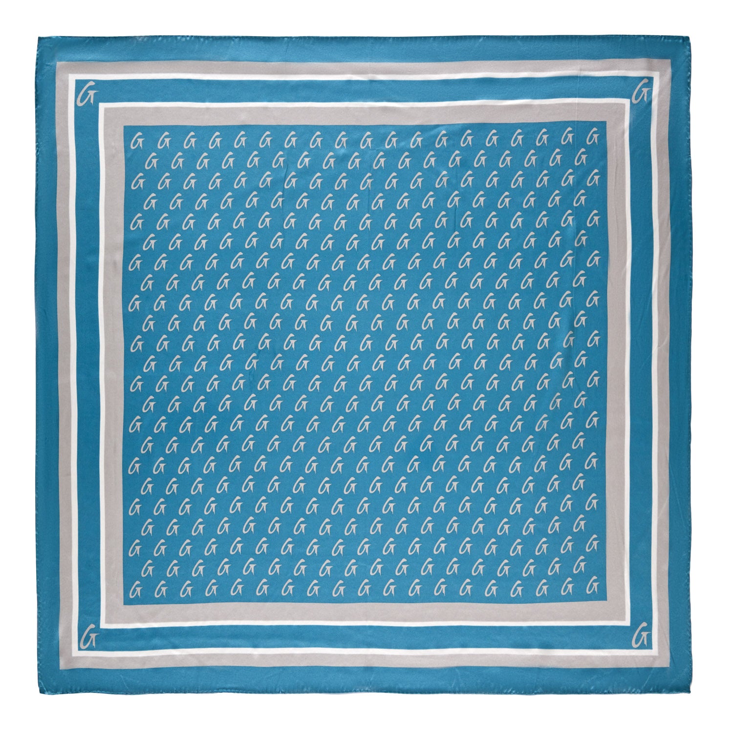 Large blue silk scarf with silver monogram pattern, featuring repeated "G" initials and border accents.