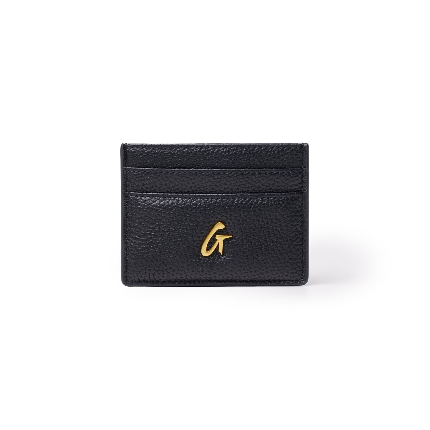 Black pebble leather card holder with gold logo, featuring multiple card slots and compact design.