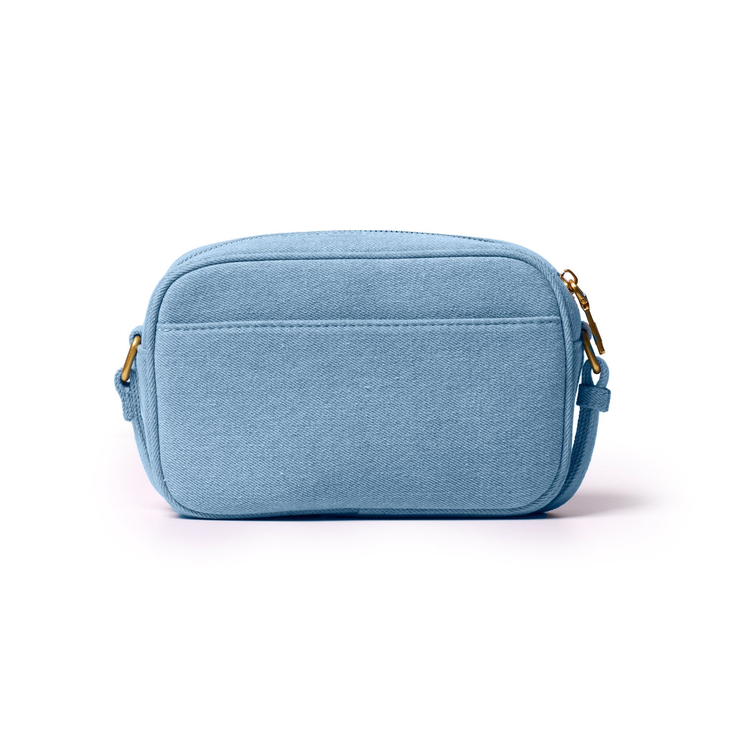 Mini denim gold camera bag with a front pocket, gold hardware, and adjustable strap, perfect for casual outings.