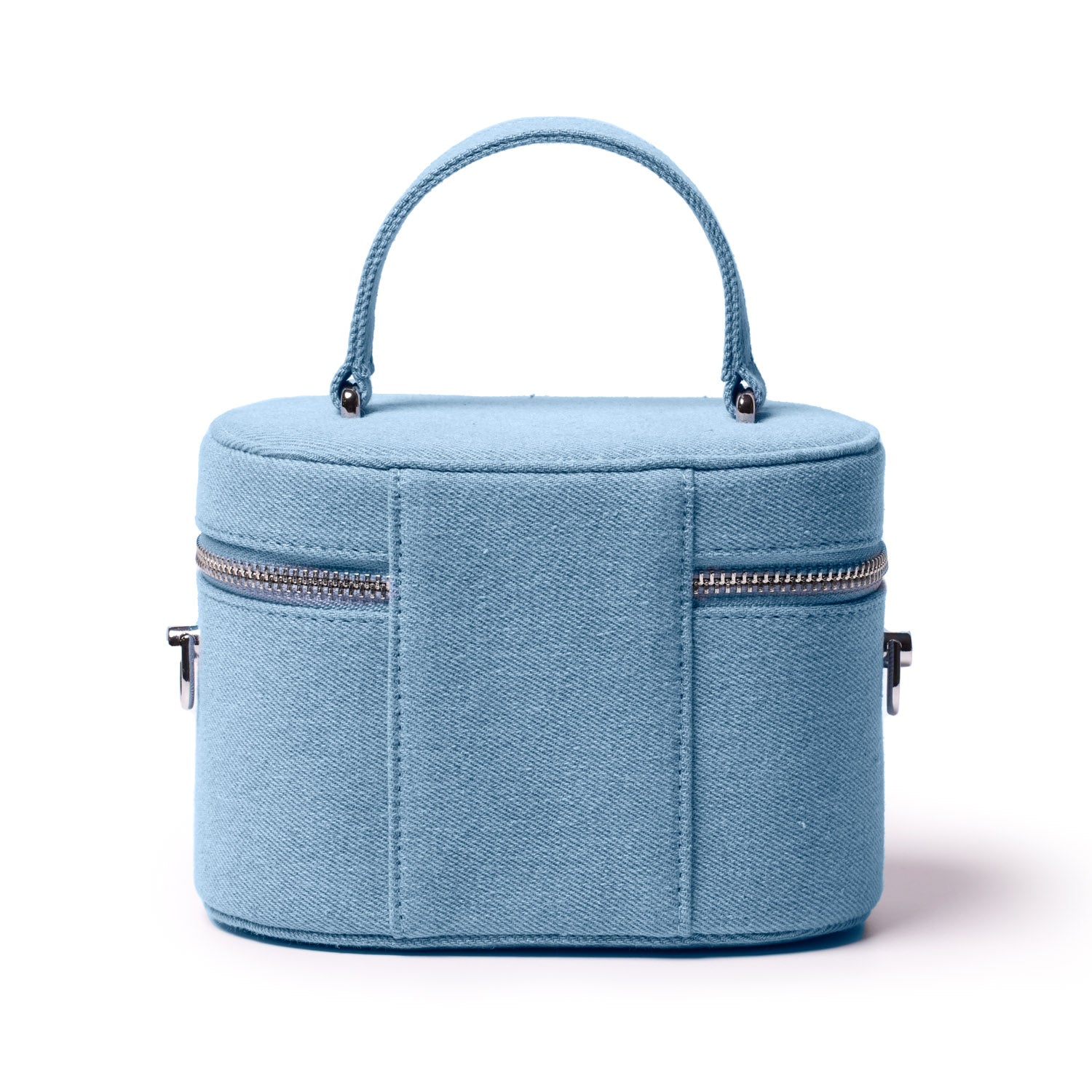Mini denim silver vanity bag with a top handle, zip closure, and front side pockets, perfect for accessories and essentials.