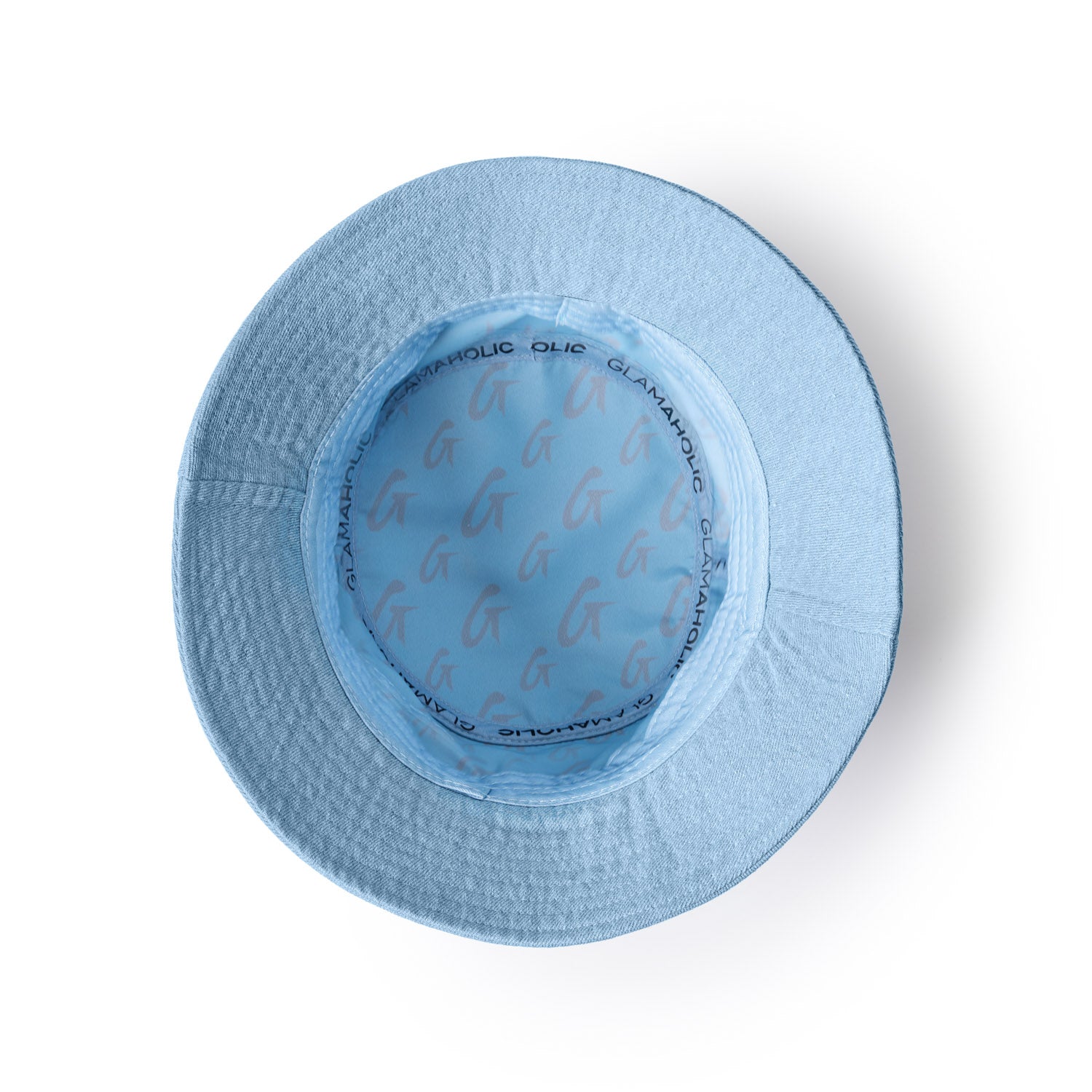 Light blue denim bucket hat with a wide brim and patterned interior lining featuring the brand name "Glamaholic.