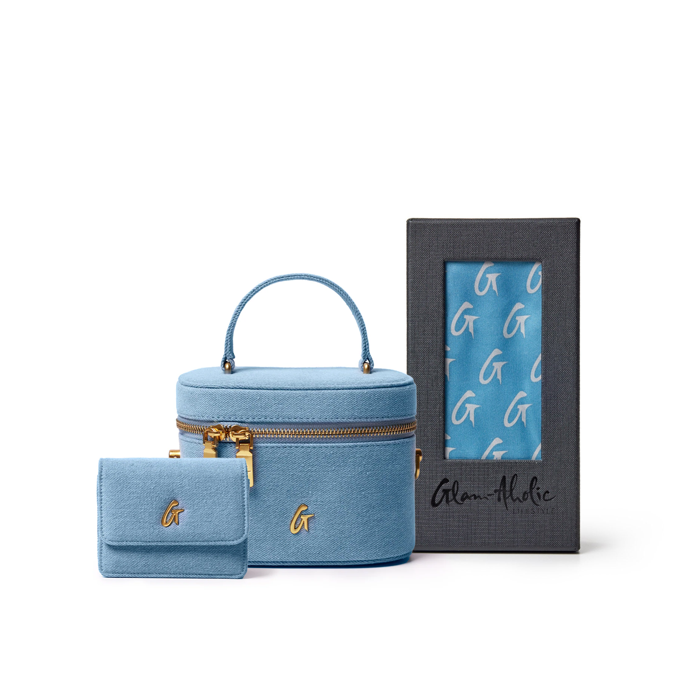 Light blue denim venue pack featuring a round case and a small wallet, both with gold accents and Glam-Aholic branding.