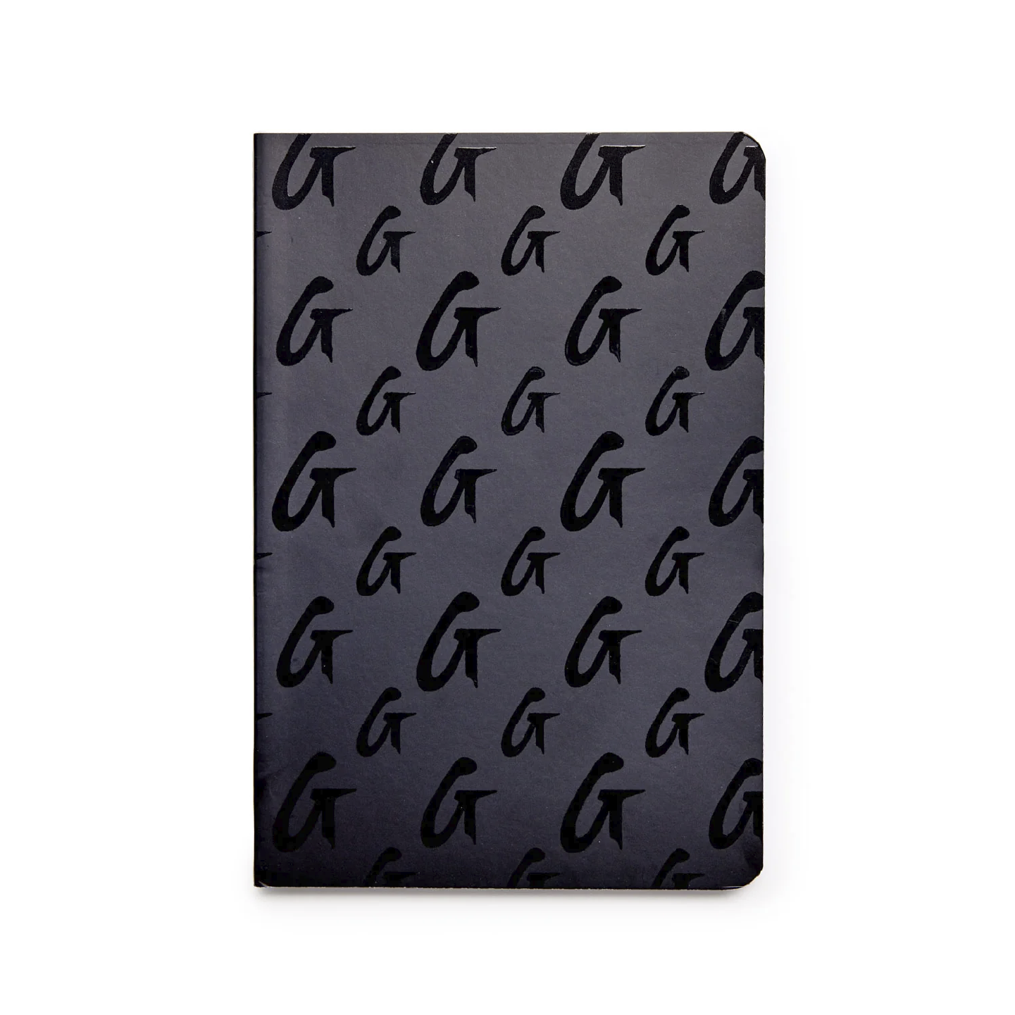 Black monogram notebook featuring a stylish repeating 'G' pattern, perfect for notes and journaling.