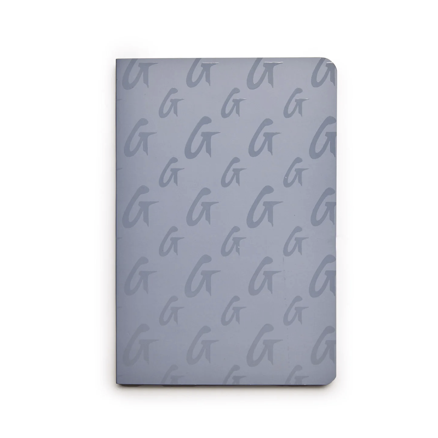 Gray monogram notebook featuring a subtle pattern of the letter G, perfect for stylish note-taking.
