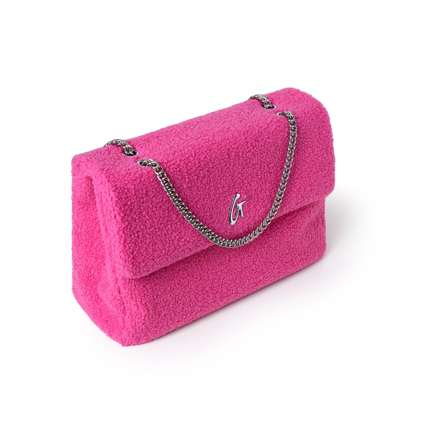 Large hot pink teddy flap bag with a silver chain strap and a small metal logo on the front.