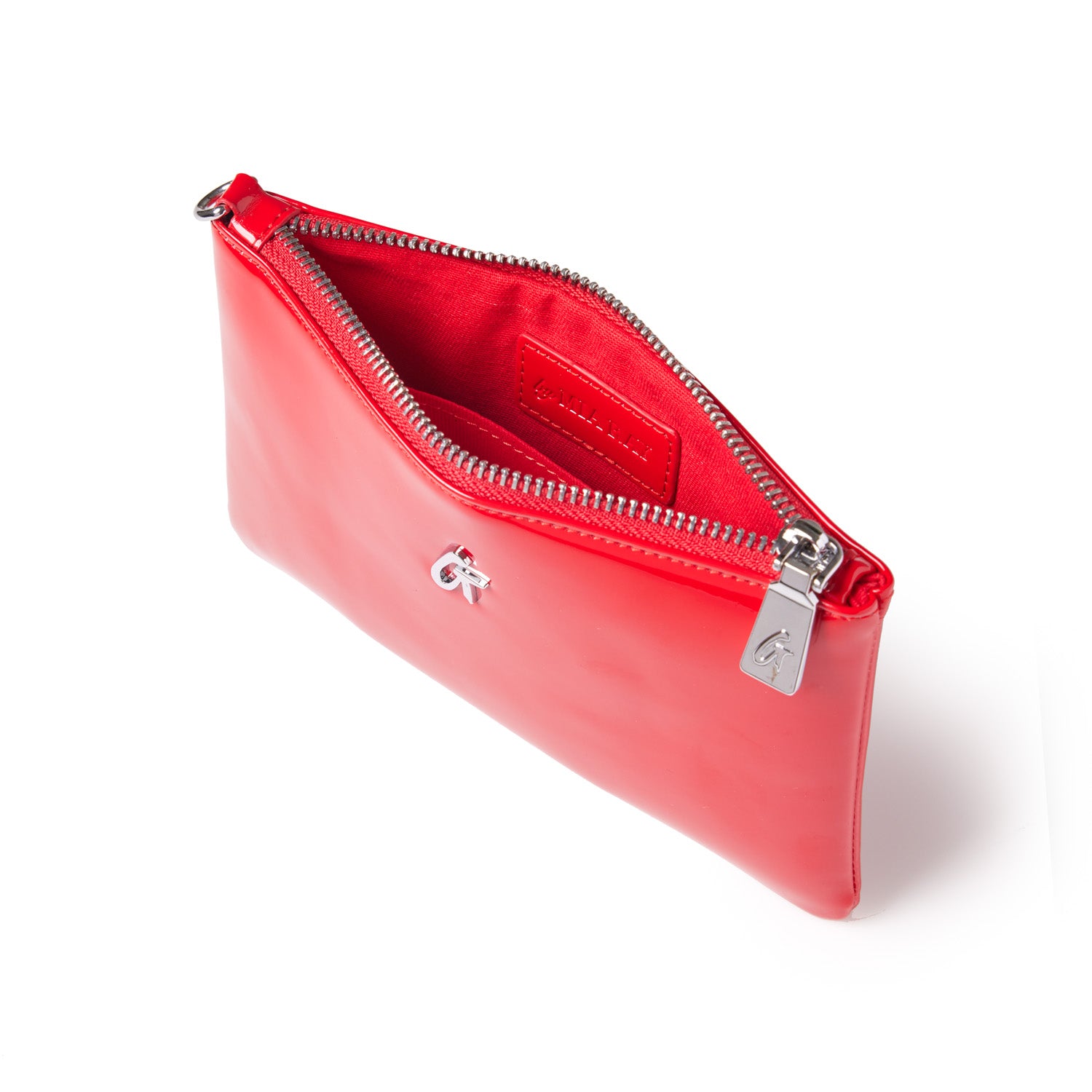 Mini silver wristlet with mirror red finish, featuring a zipper closure and interior pocket, stylish and compact.