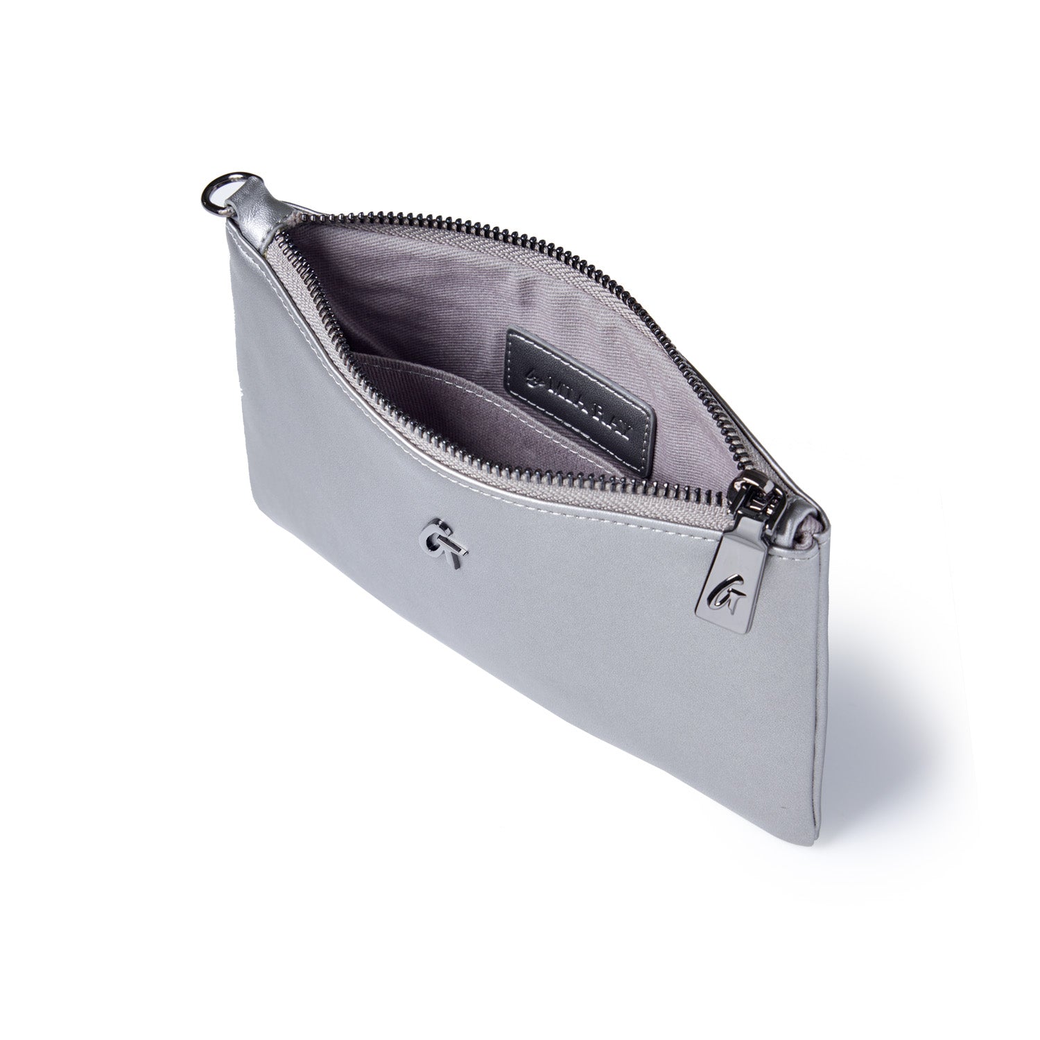 Mini gunmetal wristlet with platinum finish, open zipper revealing interior with logo tag and fabric lining.
