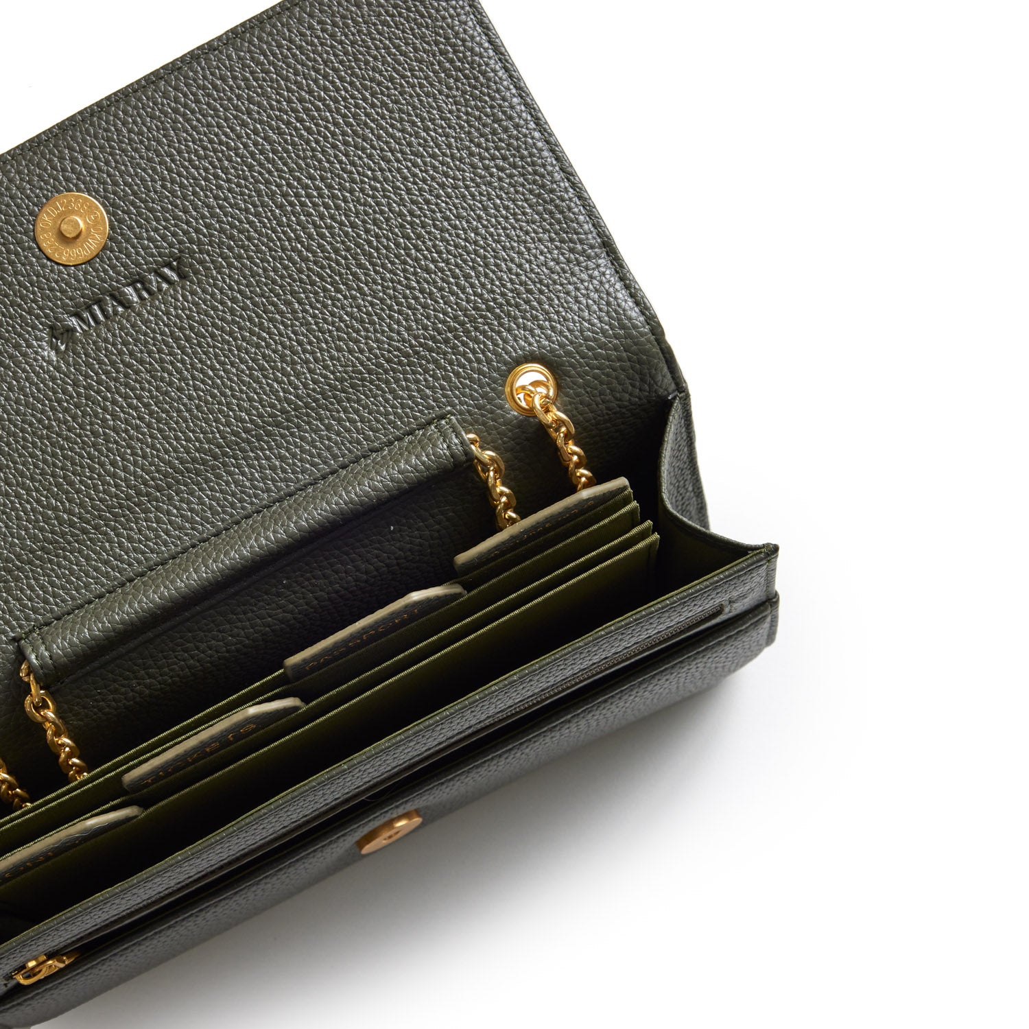 Open olive green Pebble Travel Wallet with gold chain details, card slots, and textured leather interior.