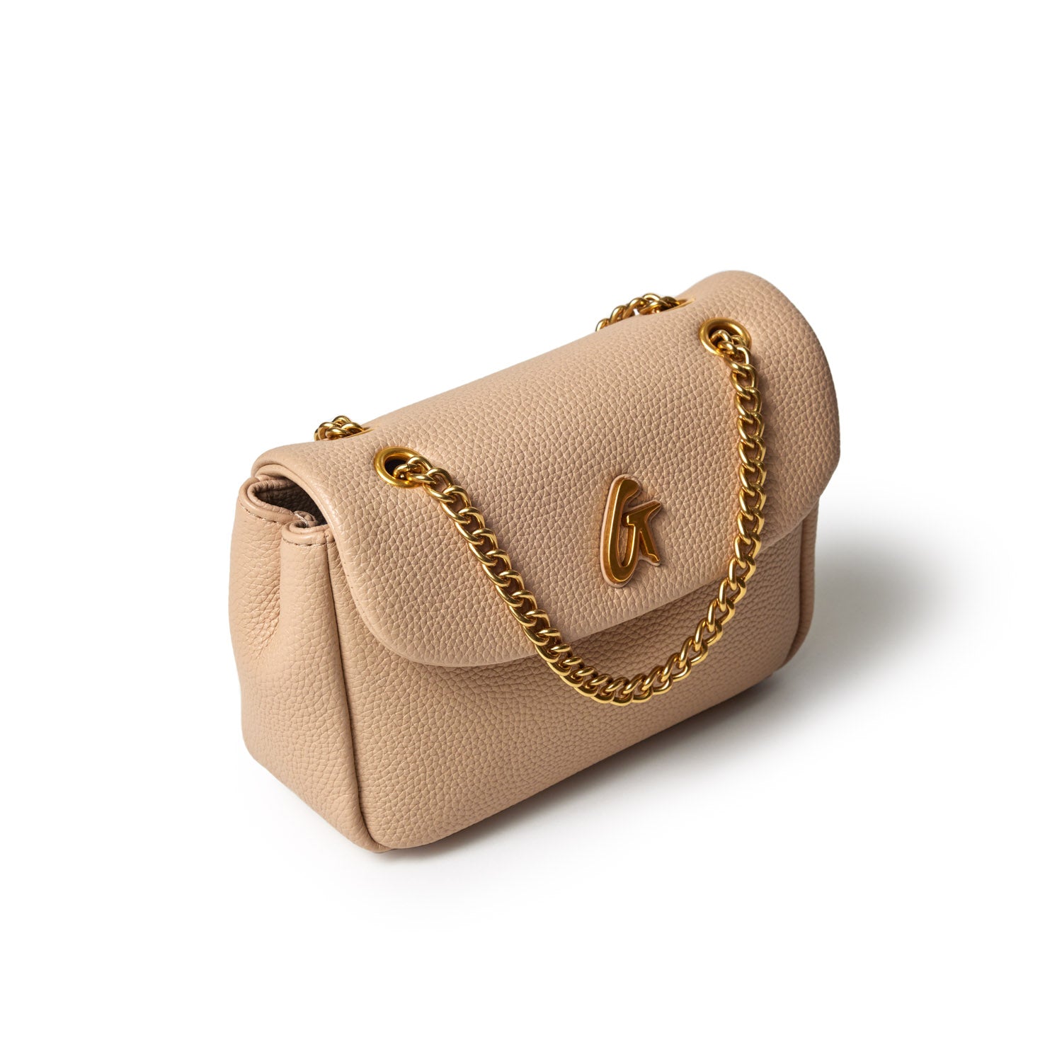 Mini Pebble Flap Bag in nude with a gold chain strap and a gold logo on the front, made of textured pebbled leather.