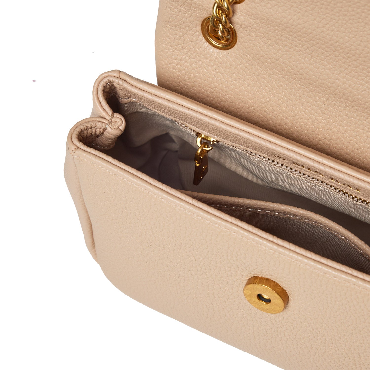 Close-up of a nude mini pebble flap bag with gold hardware, showing interior compartments and a zippered pocket.