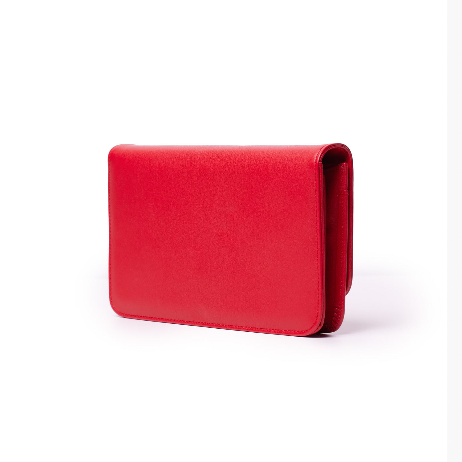 Red leather clutch bag with a sleek, minimalist design, labeled "STANDARD GOLD WOC - RED" on a white background.