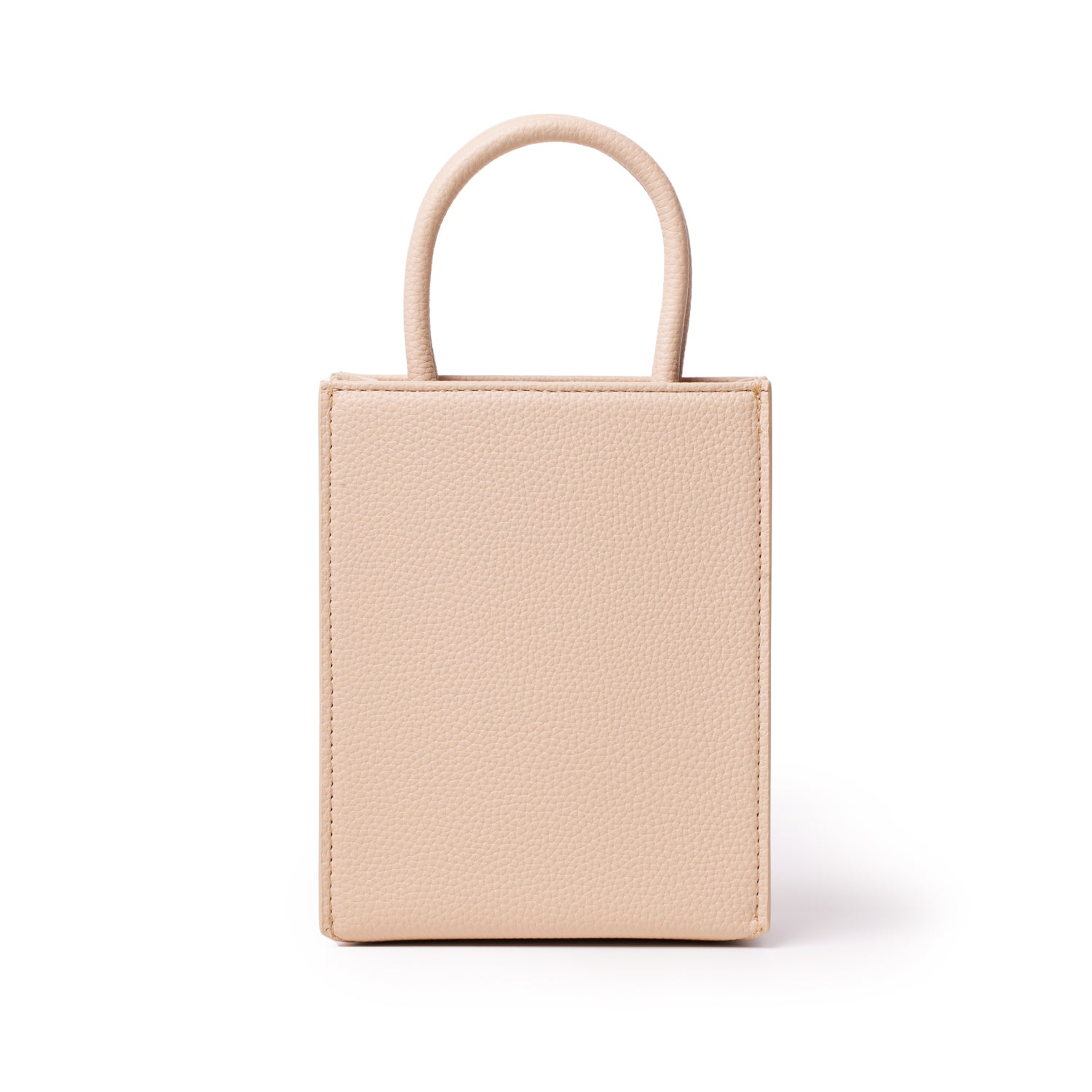 Mini pebble tote bag in nude color with textured leather finish, small rectangular shape, and rounded top handles.