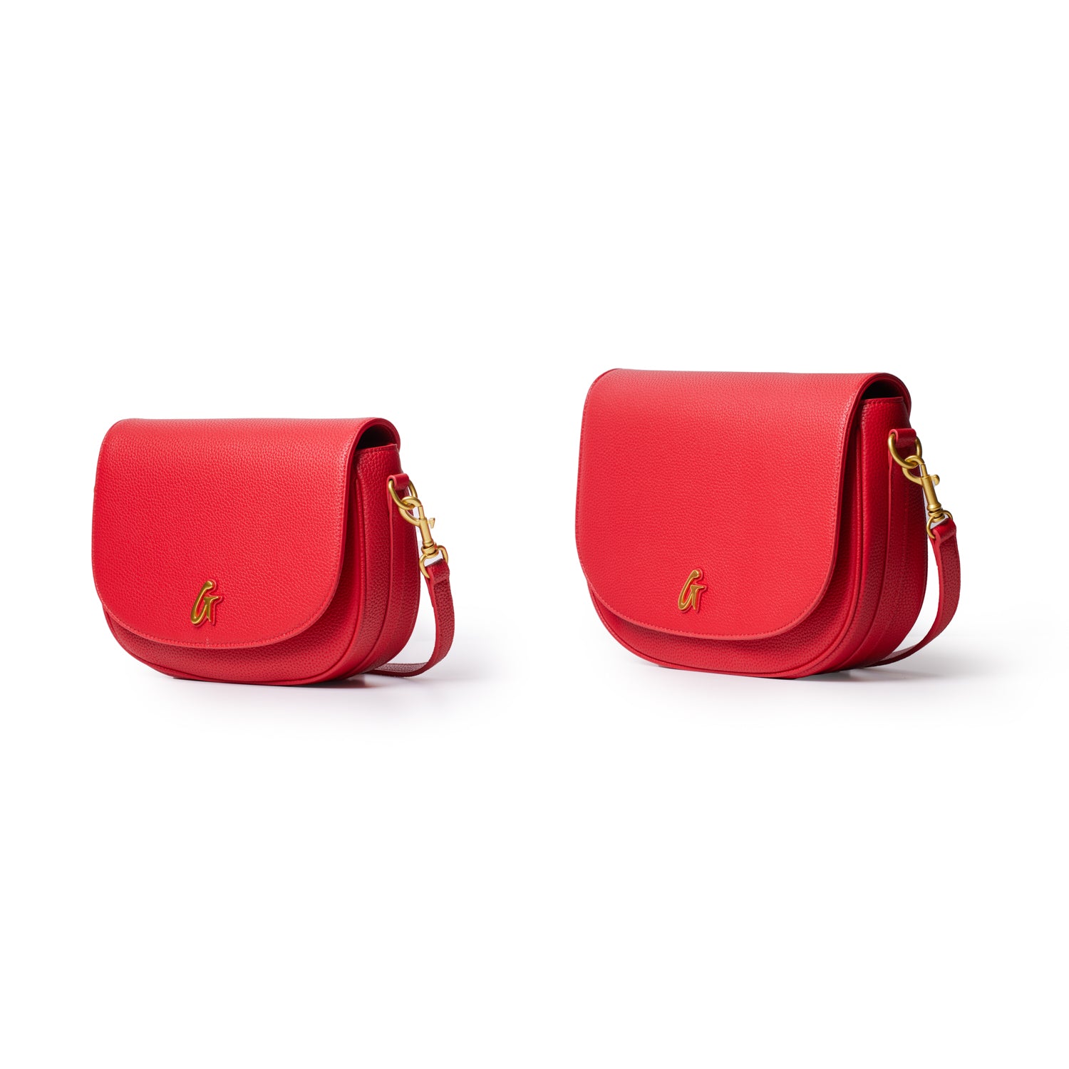 Medium red pebble leather shoulder bags with gold hardware and a small gold logo, shown in two sizes against a white background.