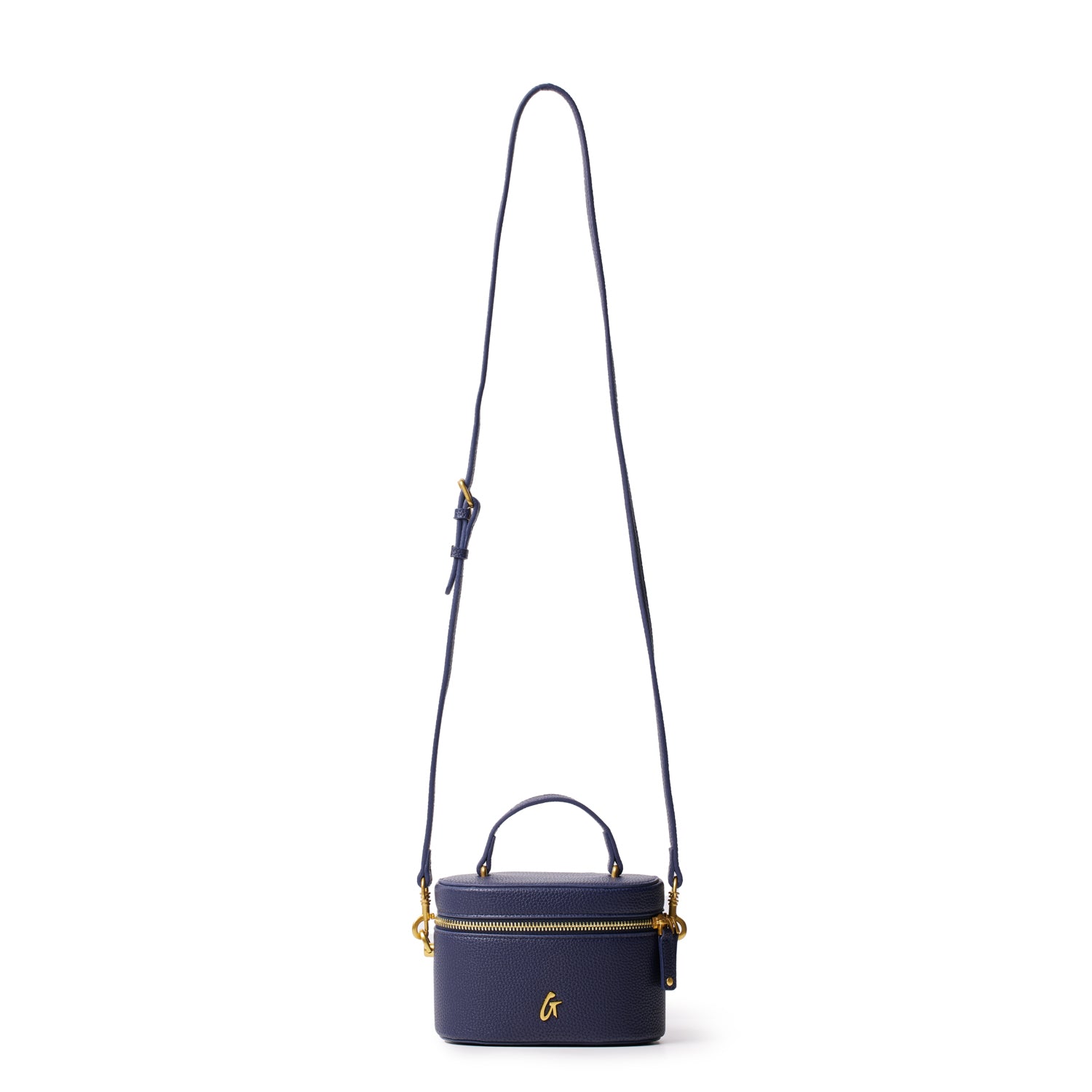Mini navy pebble vanity bag with gold accents, top handle, and adjustable shoulder strap on a white background.