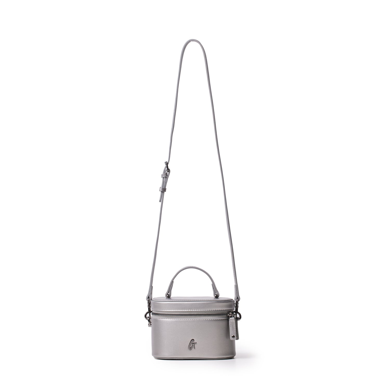 Mini smooth gunmetal platinum vanity bag with a top handle and adjustable shoulder strap, featuring a zip closure and logo detail.