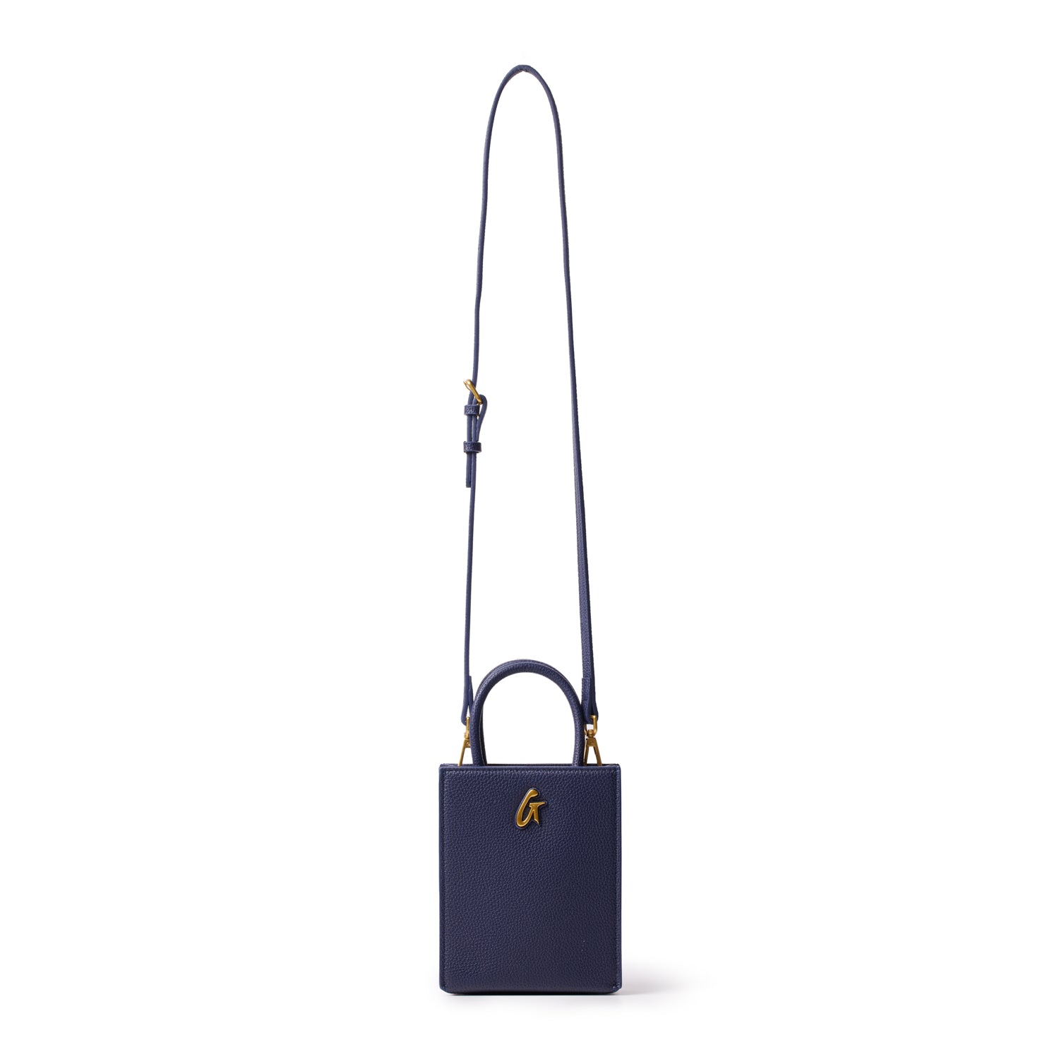 Mini pebble navy tote bag with a gold "G" logo, featuring a small rectangular shape and a long adjustable strap.