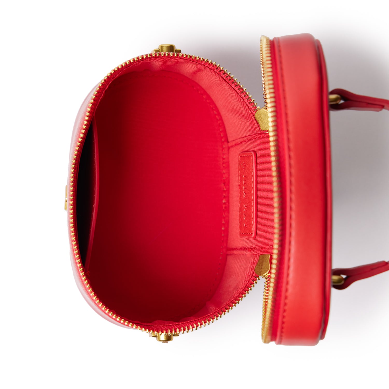Red mini smooth gold vanity bag with a zipper closure, open to reveal a spacious interior and a small side pocket.