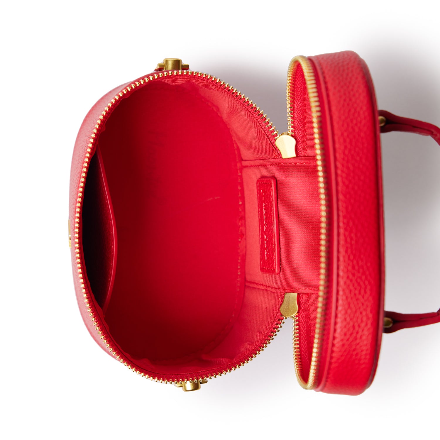 Red mini pebble vanity bag with gold zipper, open to show spacious interior and interior pocket.