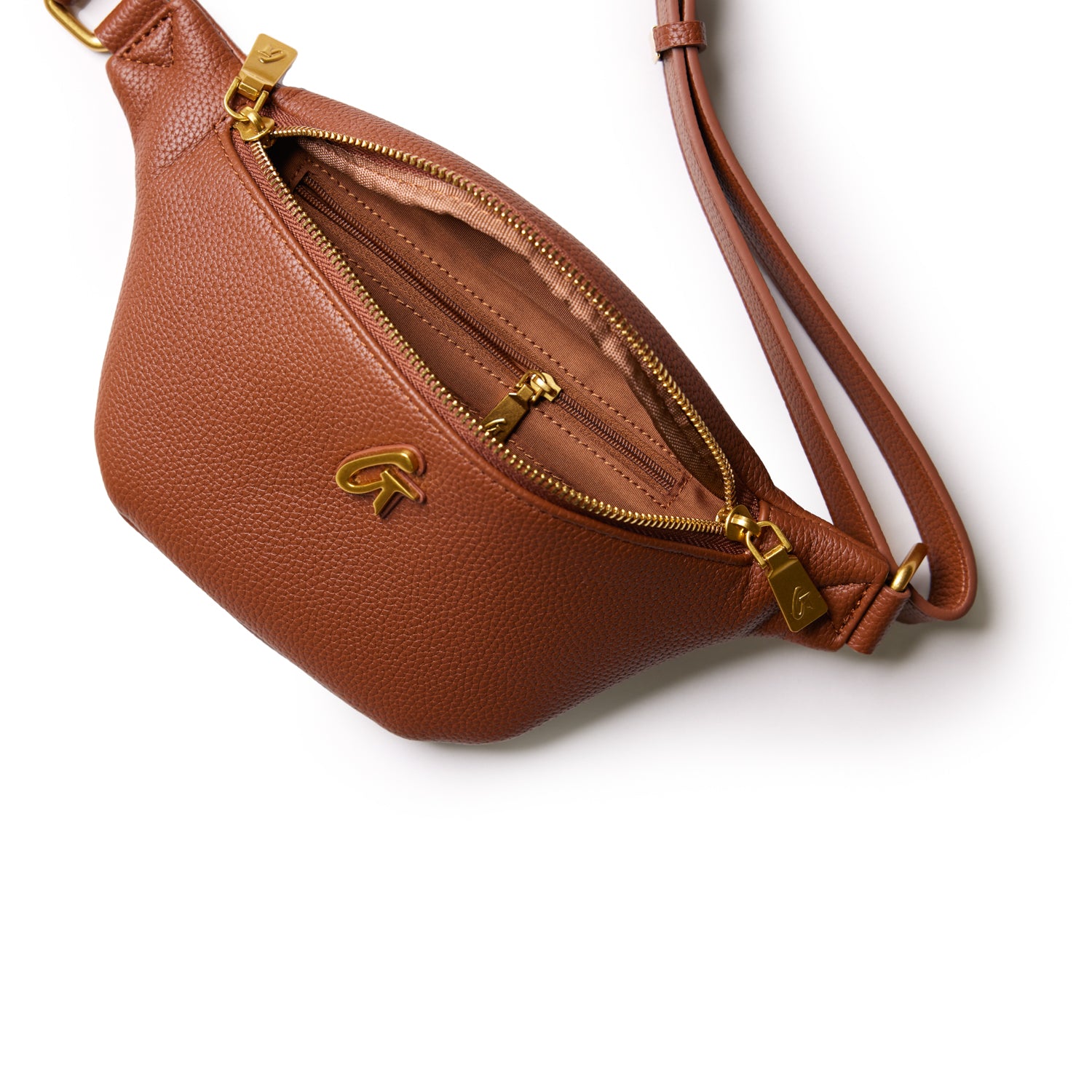 Brown pebble-textured fanny pack with gold zipper and logo, adjustable strap, and interior pocket.