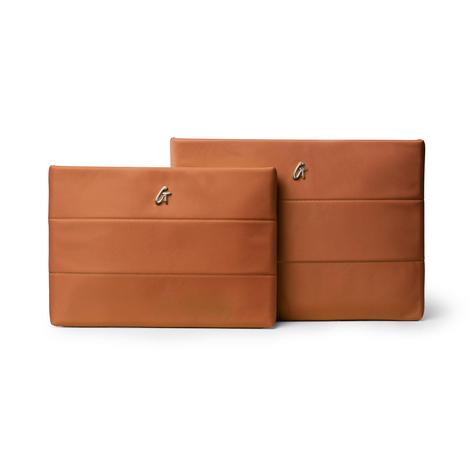 Brown nylon laptop sleeves in two sizes, featuring a sleek design and embossed logo for stylish protection.