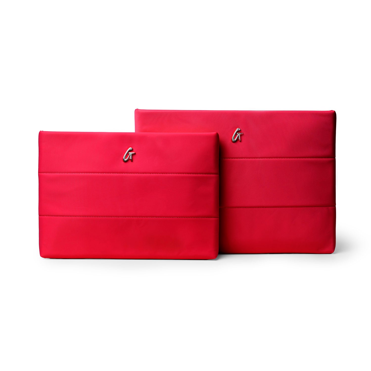 Red nylon laptop sleeves in two sizes, featuring a sleek design and embossed logo, ideal for stylish protection.