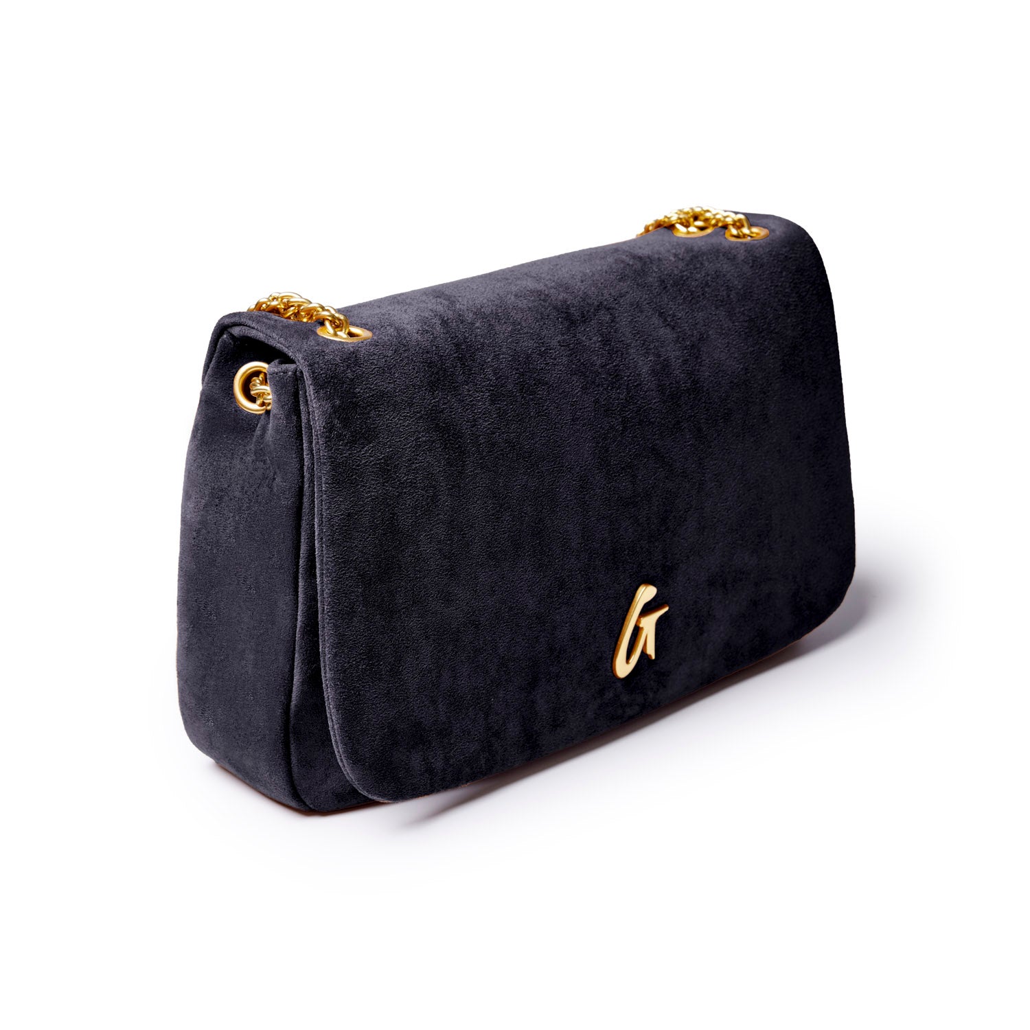 Medium black suede flap bag with a gold chain strap and a stylish logo detail, perfect for chic, affordable luxury.