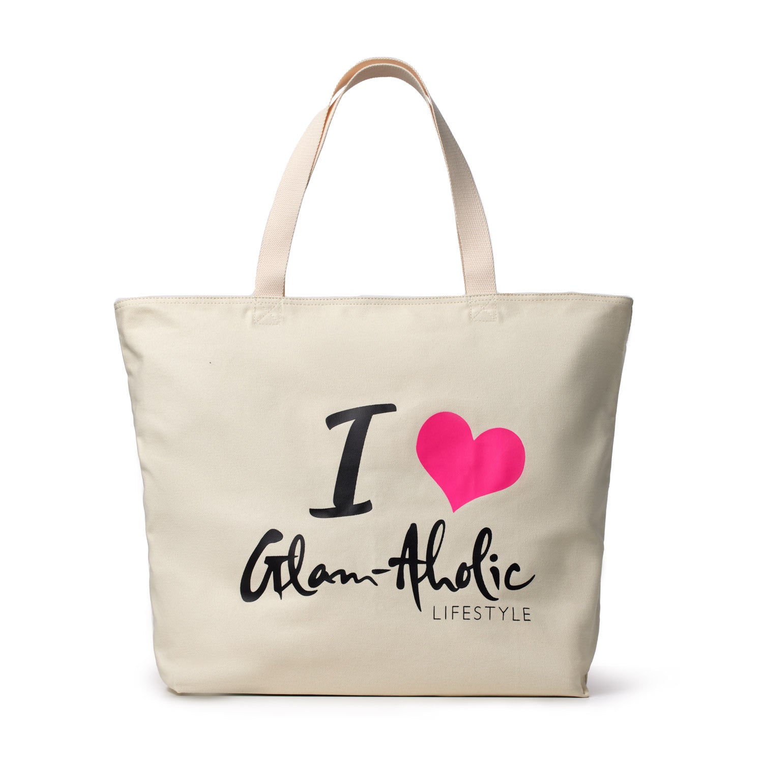 Hot pink heart graphic on a cream canvas tote bag with "I Love Glam-Aholic Lifestyle" text and beige handles.