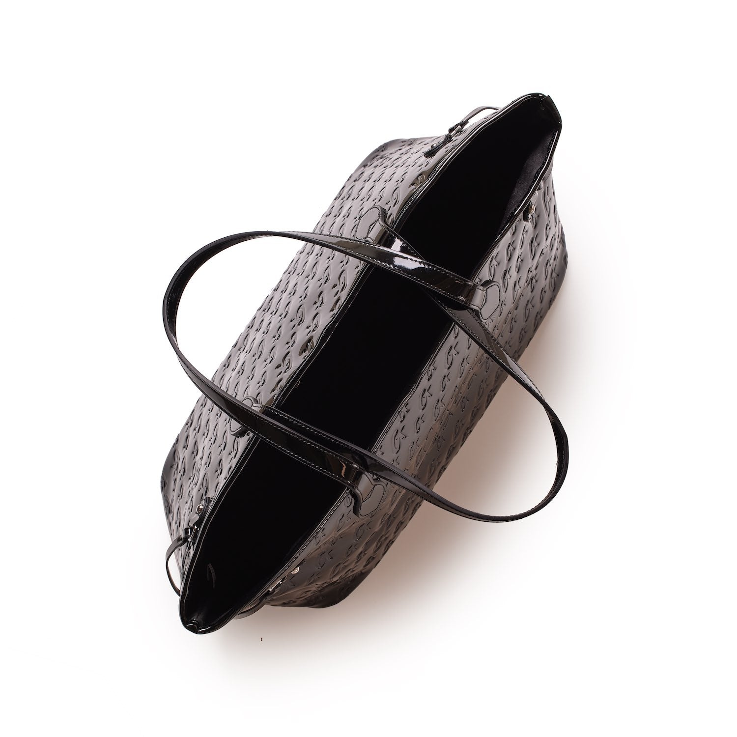 Black Monogram Glam Tote with a glossy, textured finish and sleek handles, open to reveal spacious interior.