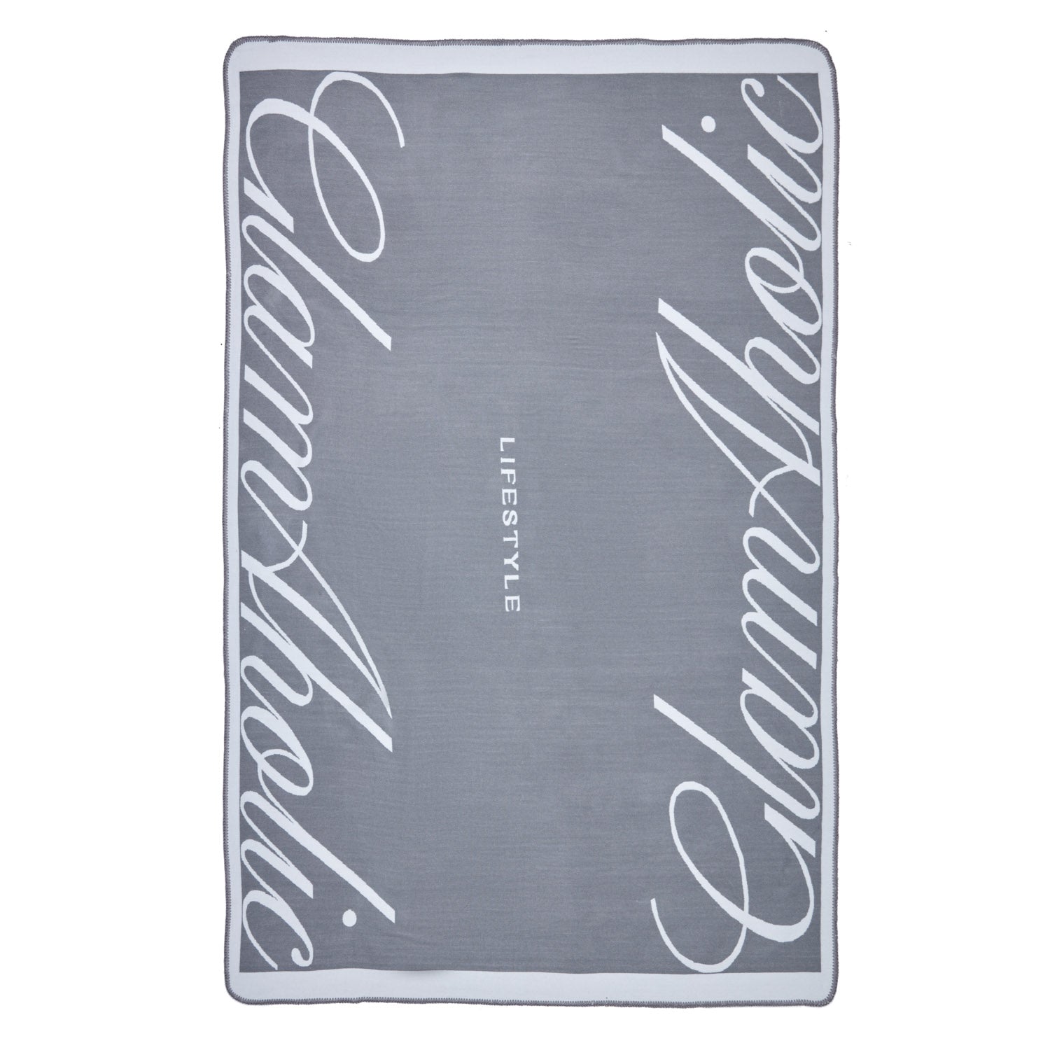 Gray luxe throw blanket with "Signature Logo" and "Lifestyle" text in white, featuring a stylish, modern design.