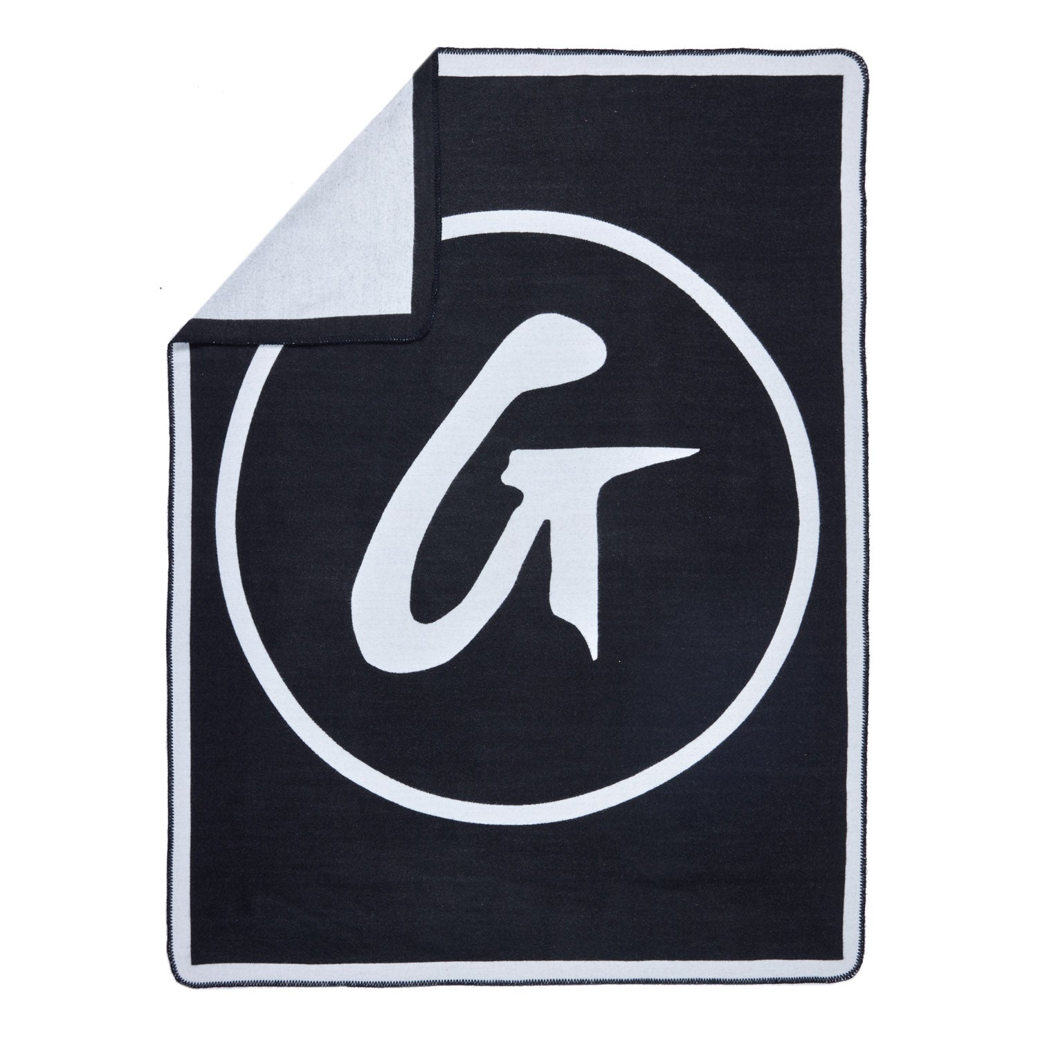 Black classic throw blanket with a bold white logo design, soft and cozy for home or outdoor use.