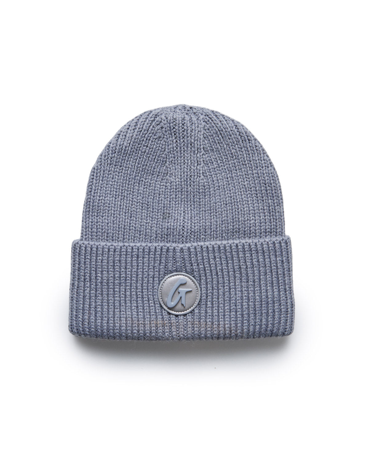 Gray knit beanie with a folded cuff and a circular logo patch featuring a stylized "G" on the front.