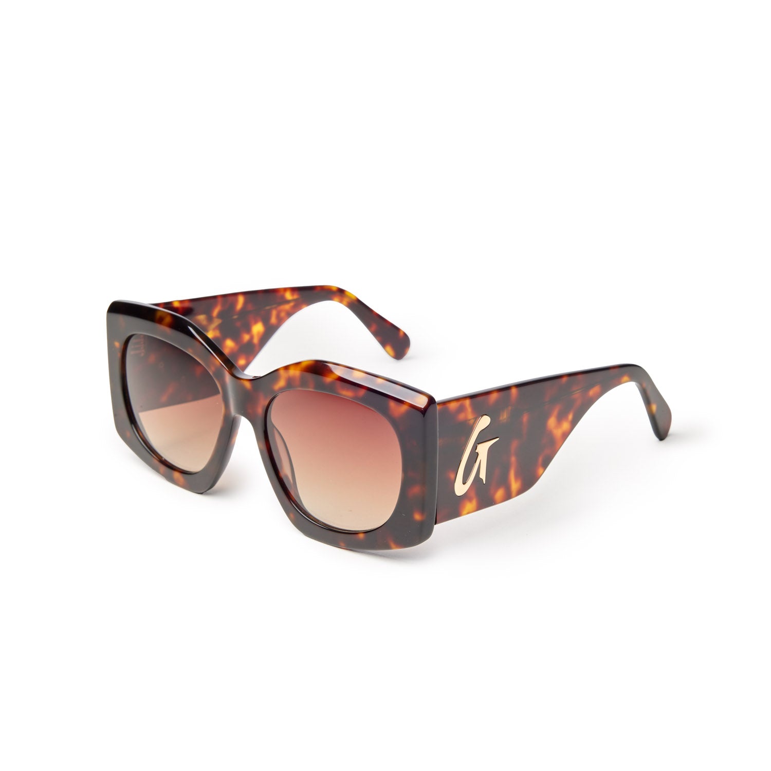 Oversized tortoise shell sunglasses featuring gradient lenses and a stylish logo on the side, perfect for a chic look.