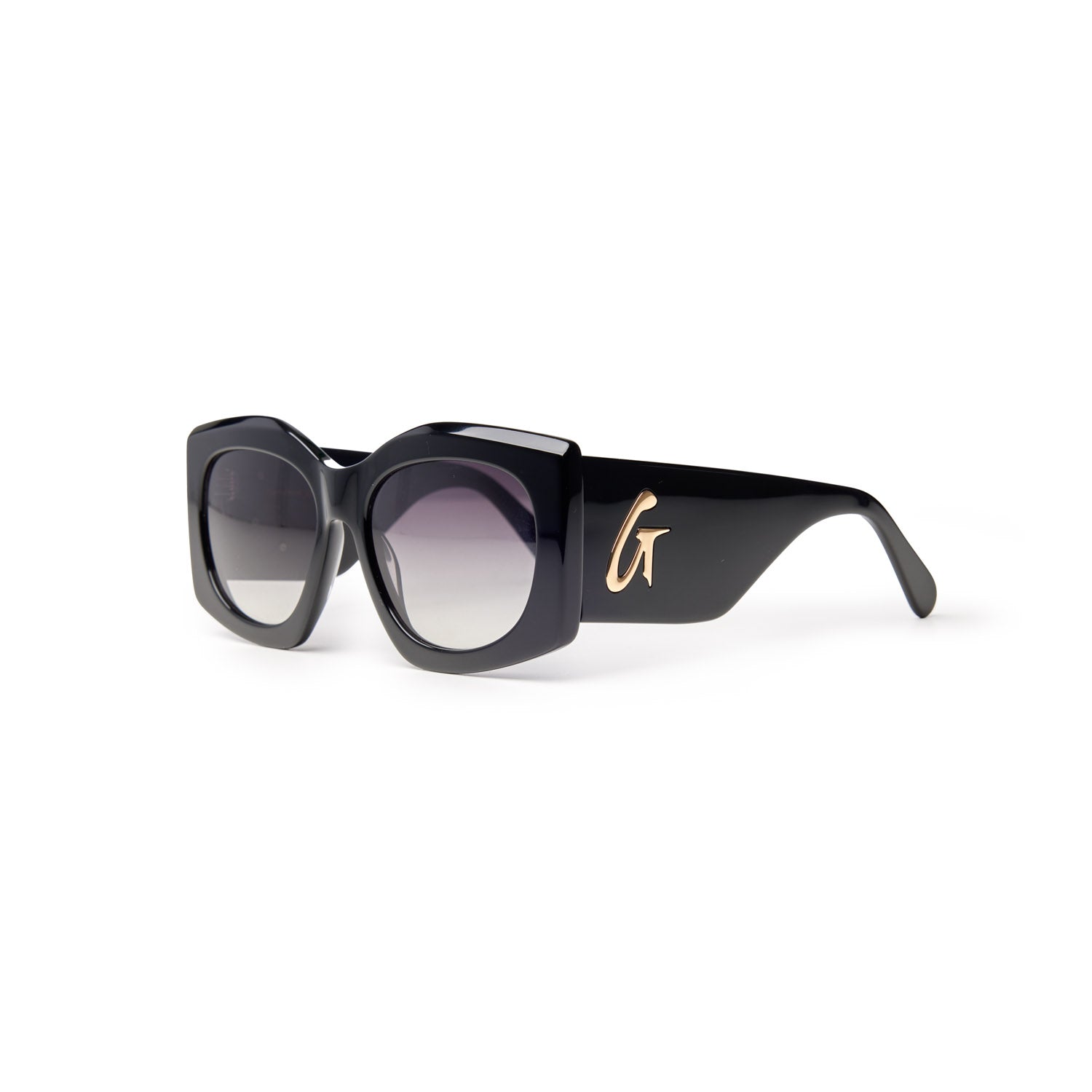 Stylish black oversized sunglasses with gradient lenses and a gold logo detail on the side, perfect for a chic look.