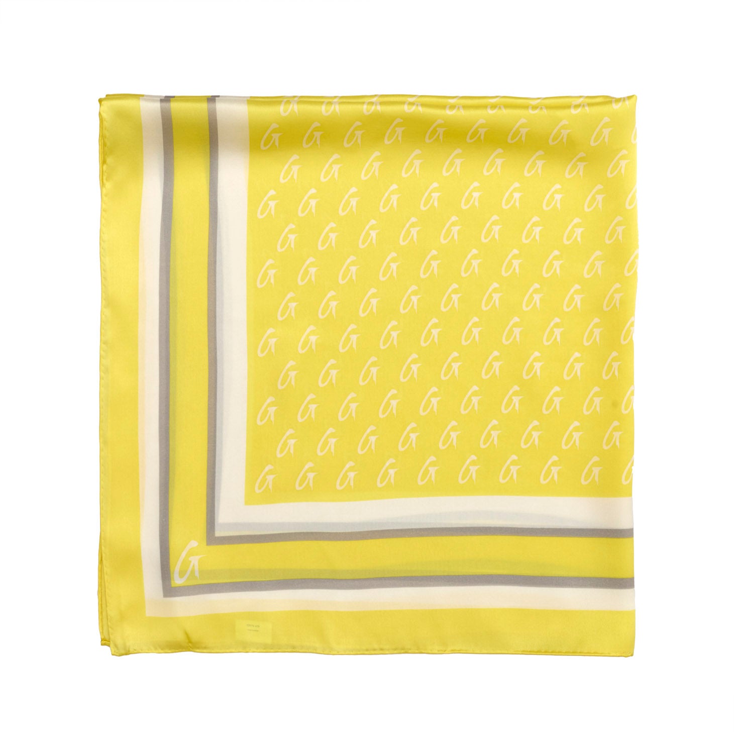 Medium yellow silk scarf featuring a monogram pattern and contrasting border, perfect for adding a touch of luxury.
