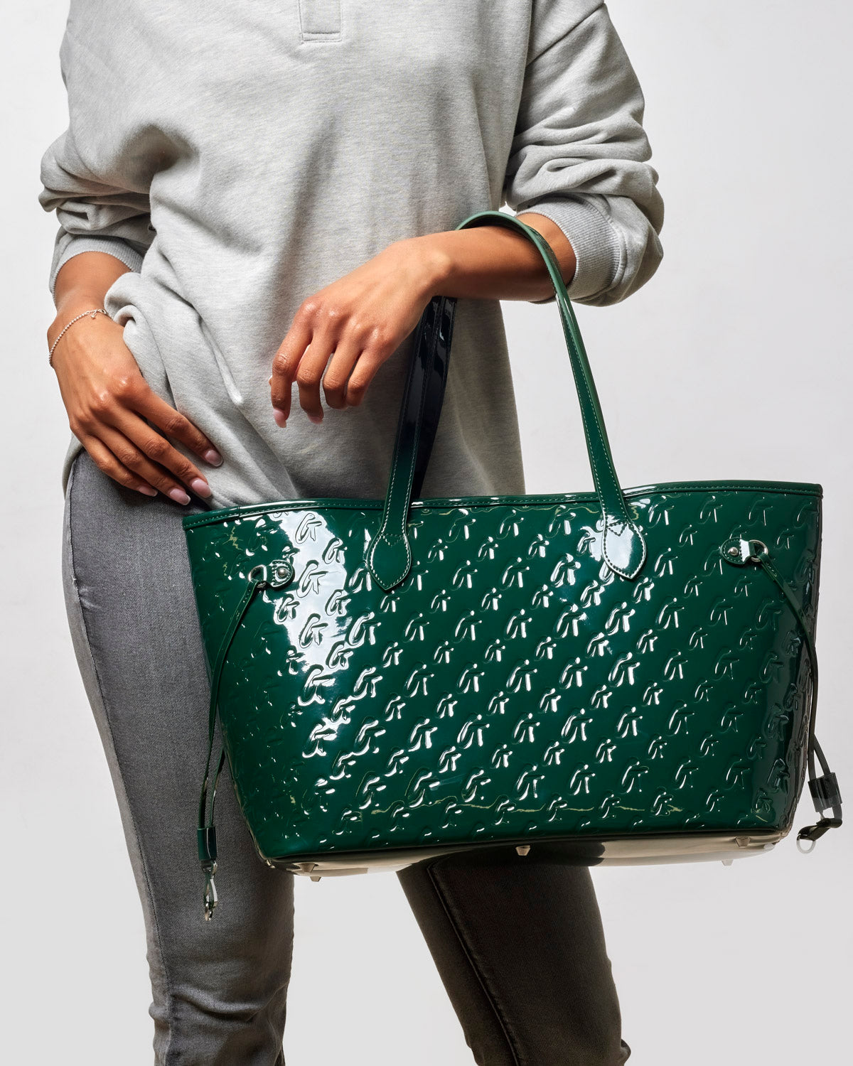Mirror green monogram glam tote with wristlet, featuring a glossy finish and stylish design, perfect for everyday use.