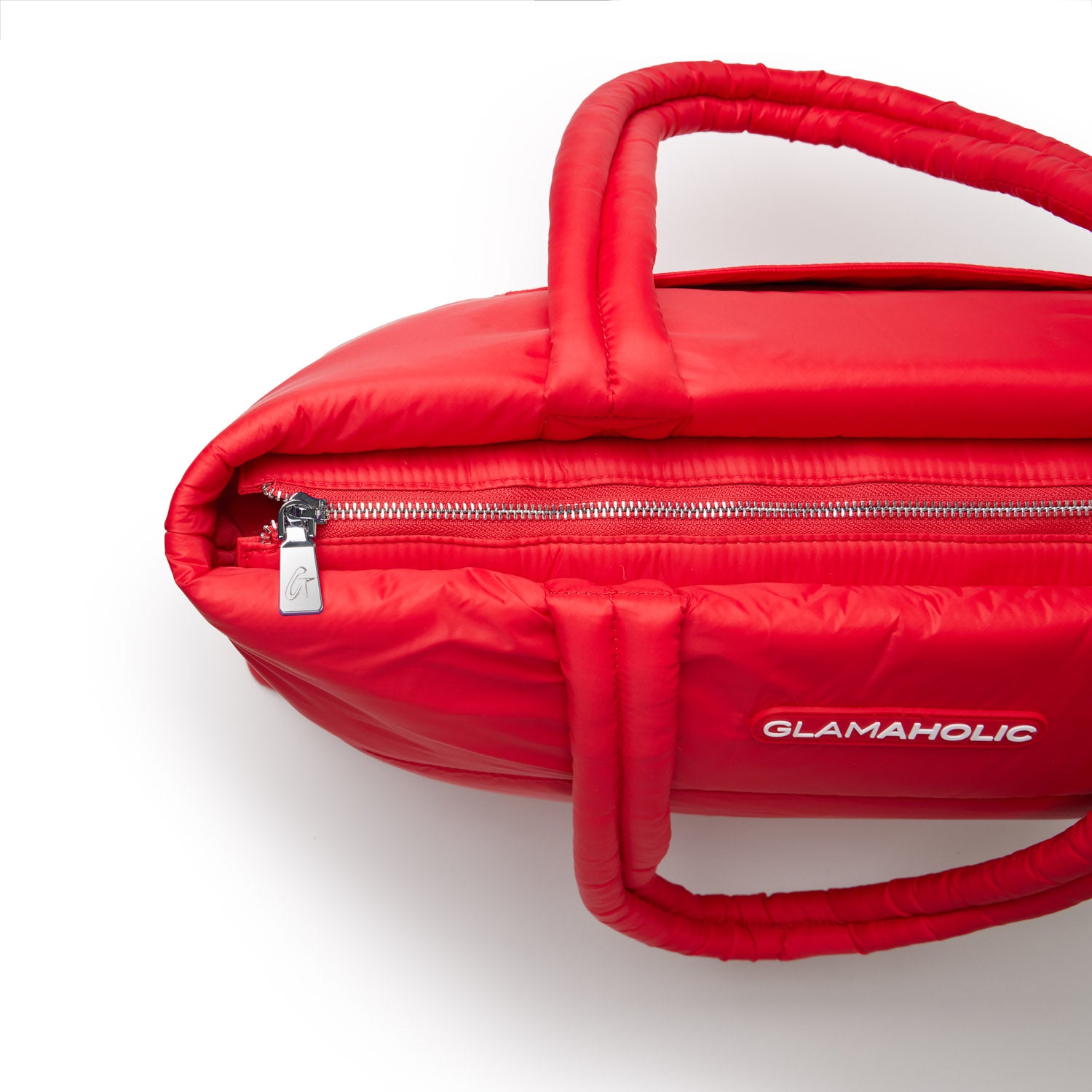 Red athletic nylon tote bag with a zippered top and sturdy handles, featuring the Glam-Aholic logo.