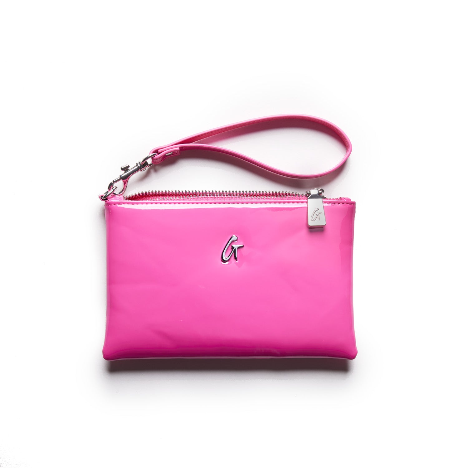 Mini silver wristlet in mirror hot pink with a silver "G" logo, zipper closure, and matching pink wrist strap.