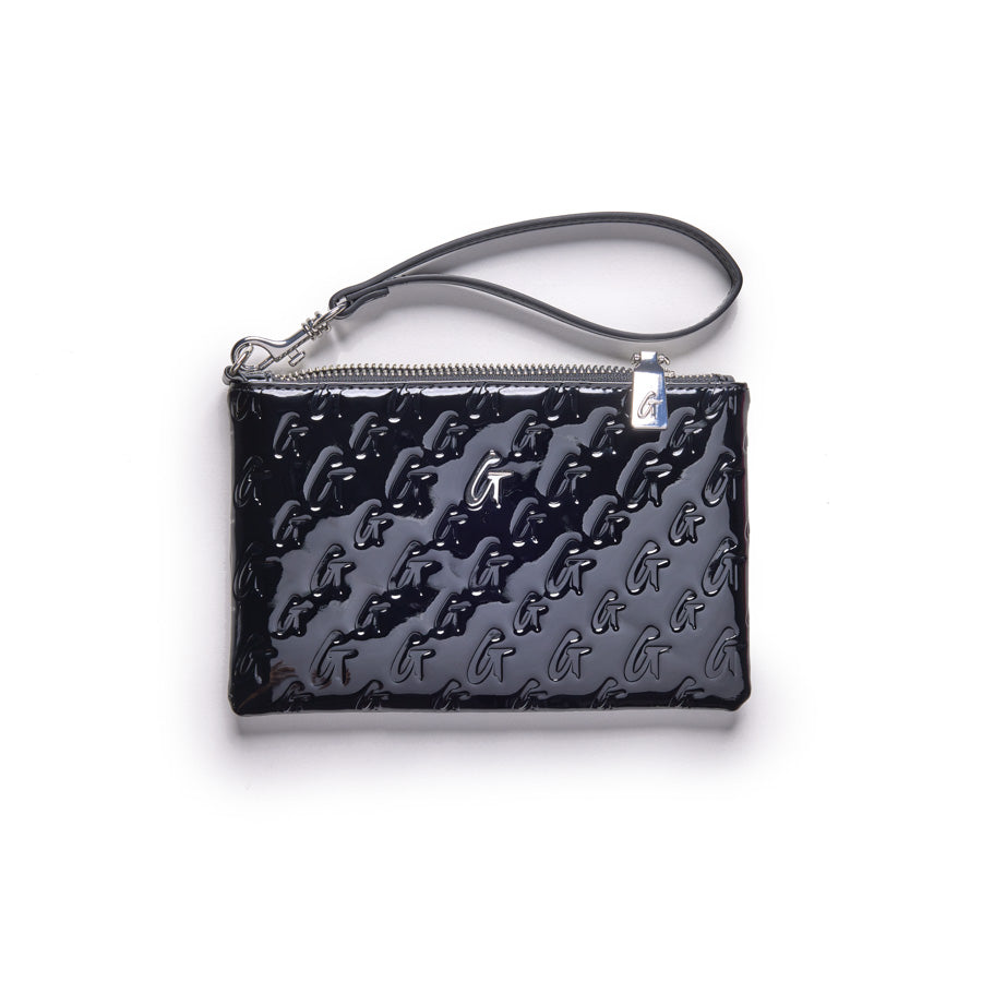 Mini Monogram silver wristlet in mirror black with embossed G logo pattern and a wrist strap.