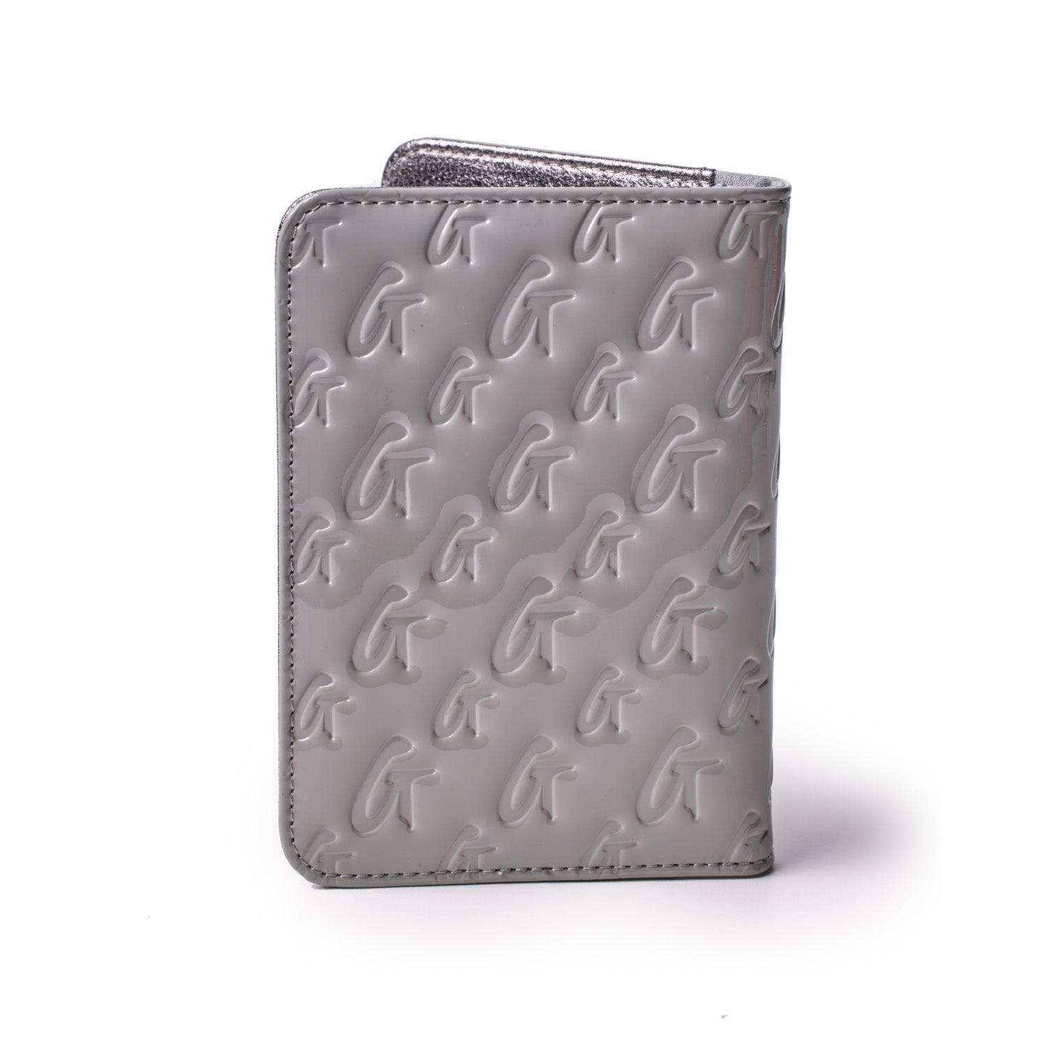 Mirror gray monogram passport holder with embossed G and arrow pattern, featuring a sleek, reflective finish.