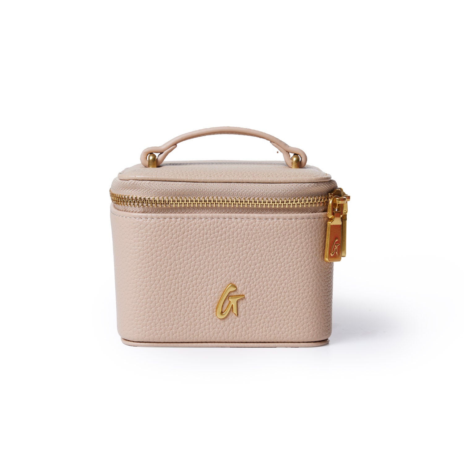 Pebble jewelry case in nude color with gold zipper and logo, compact design, textured faux leather exterior, and top handle.