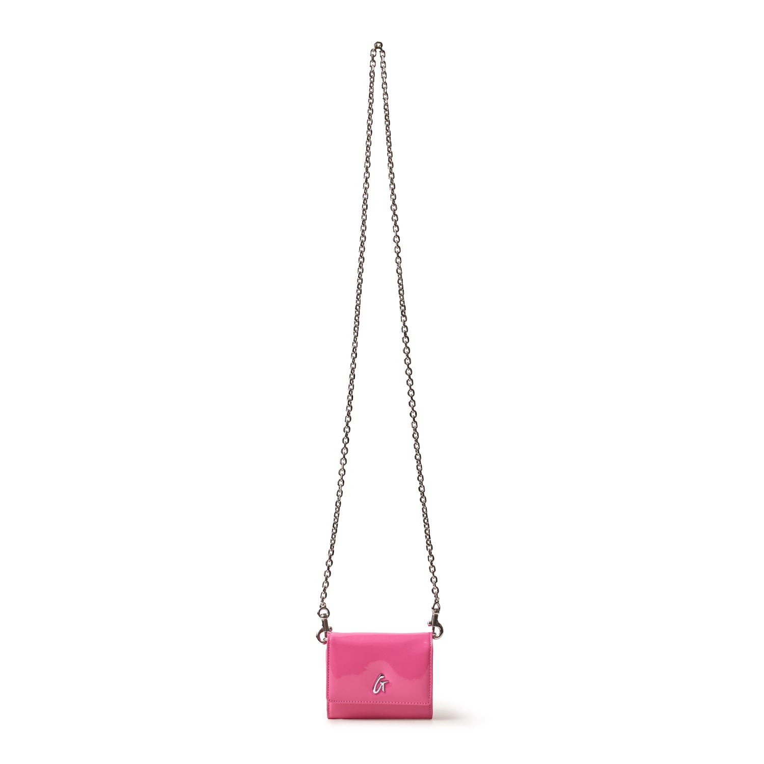 Small pink compact bag with a silver chain strap, silver logo, and a mirror hot pink finish.