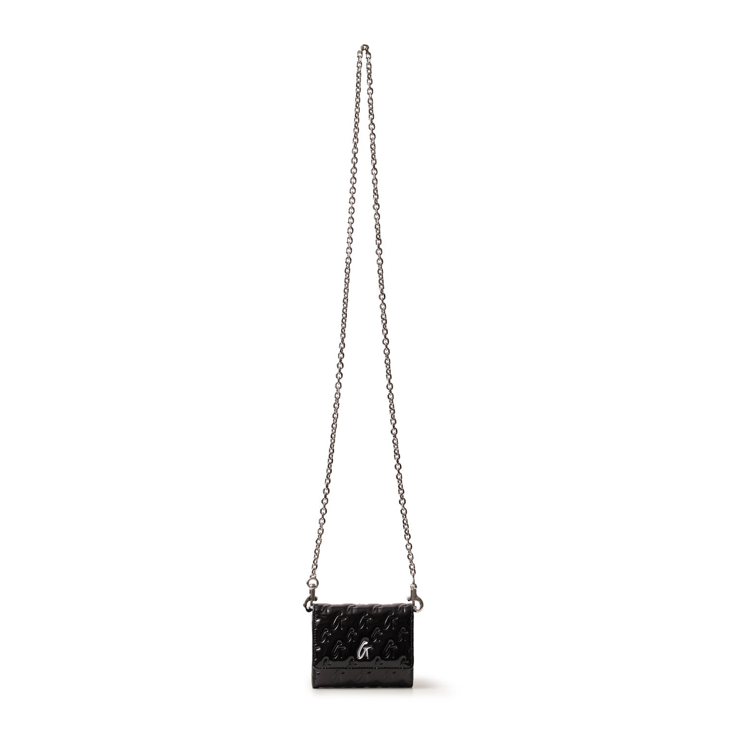 Monogram silver compact WOC with a black mirror finish, featuring a chain strap and embossed monogram pattern.