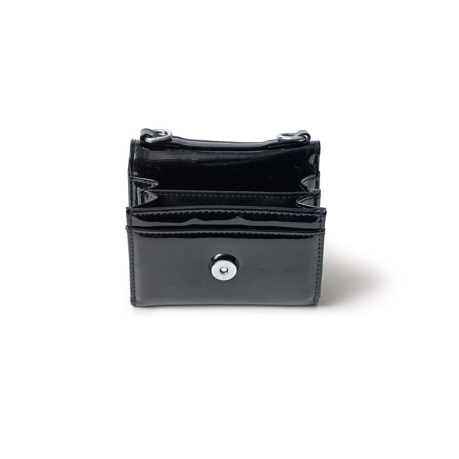 Black patent leather compact wallet with silver hardware, multiple card slots, and a snap closure.