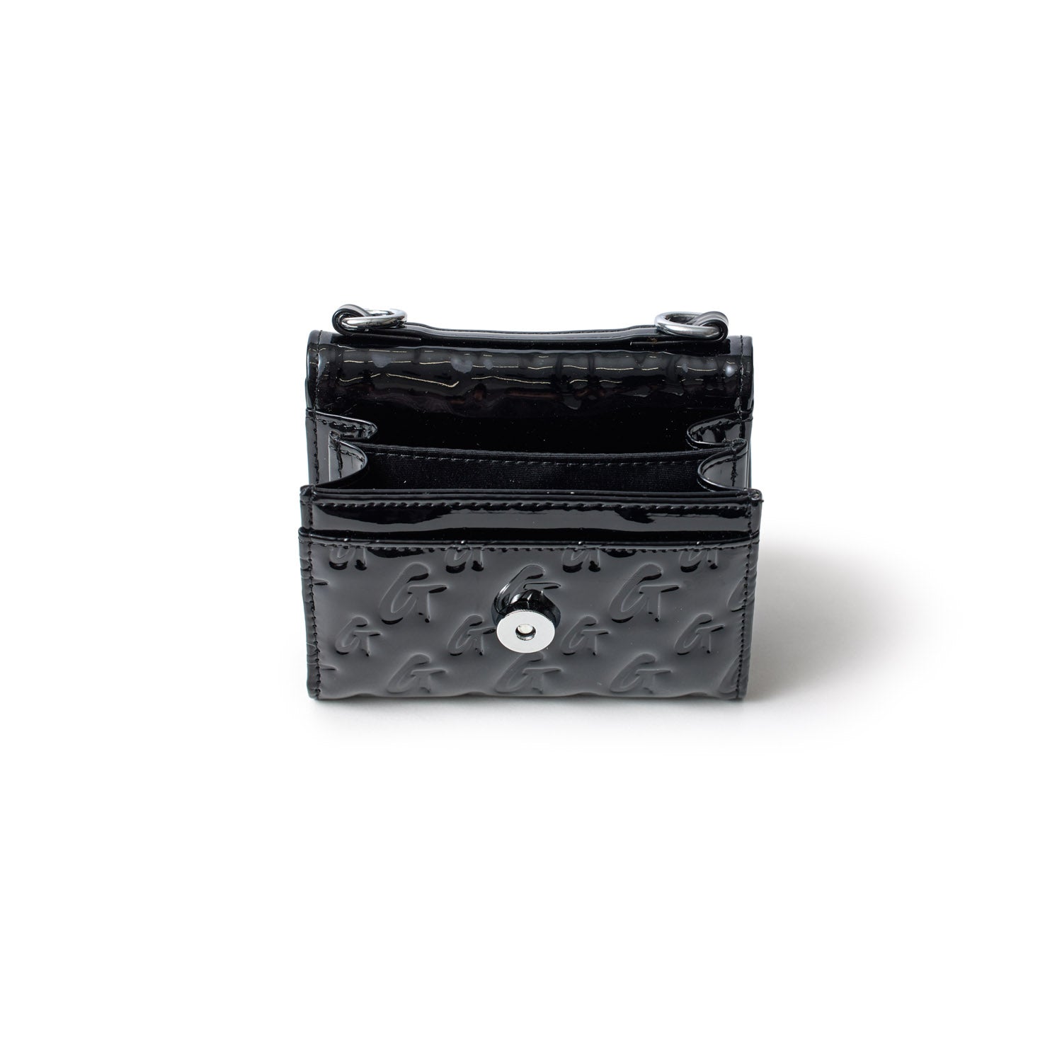 Small black compact mirror with a glossy finish, embossed with a repeating "G" pattern and silver hardware.