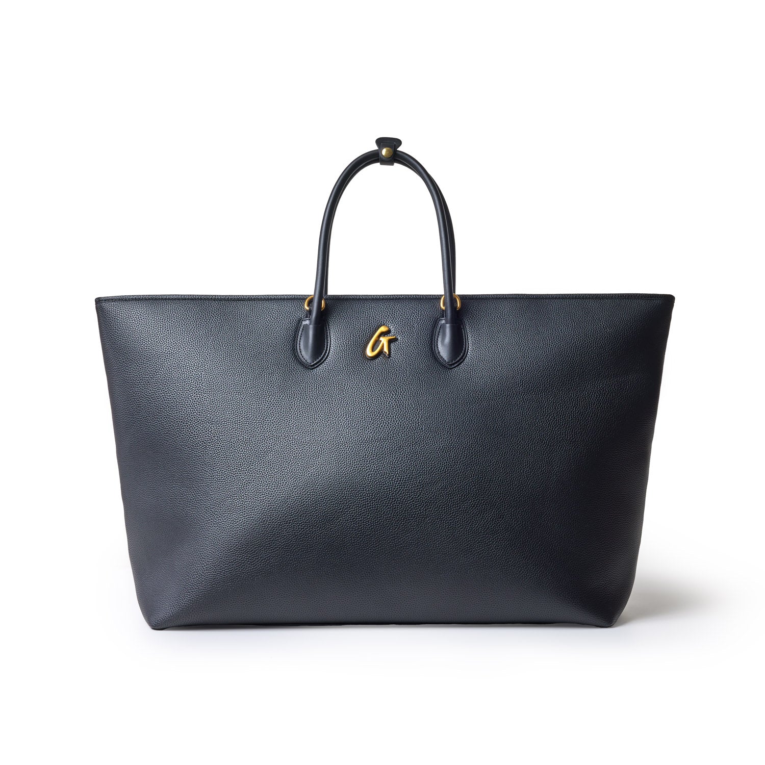 Black jumbo pebble tote bag with dual handles and a gold "G" logo, made of textured leather.