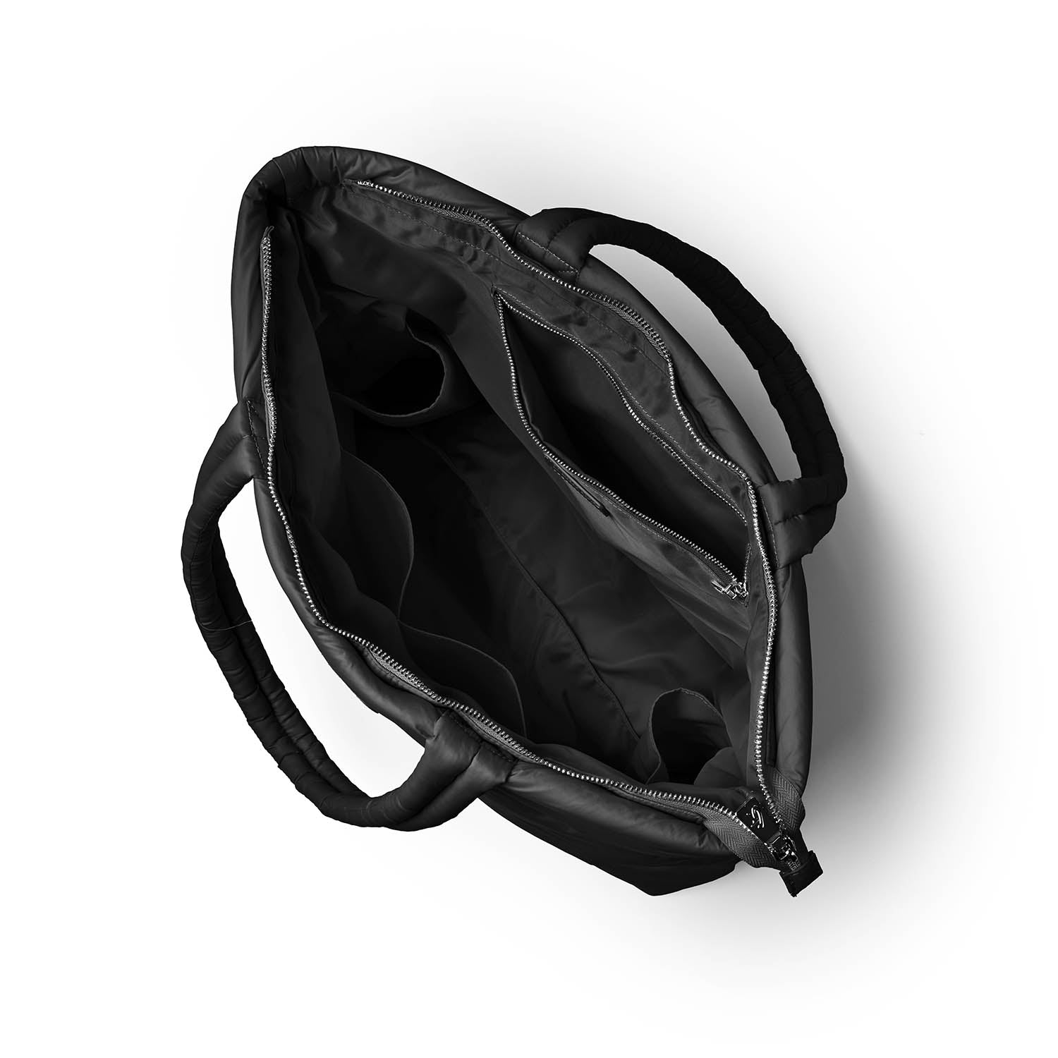 Black athletic nylon tote bag viewed from above, featuring multiple interior compartments and a zippered closure.