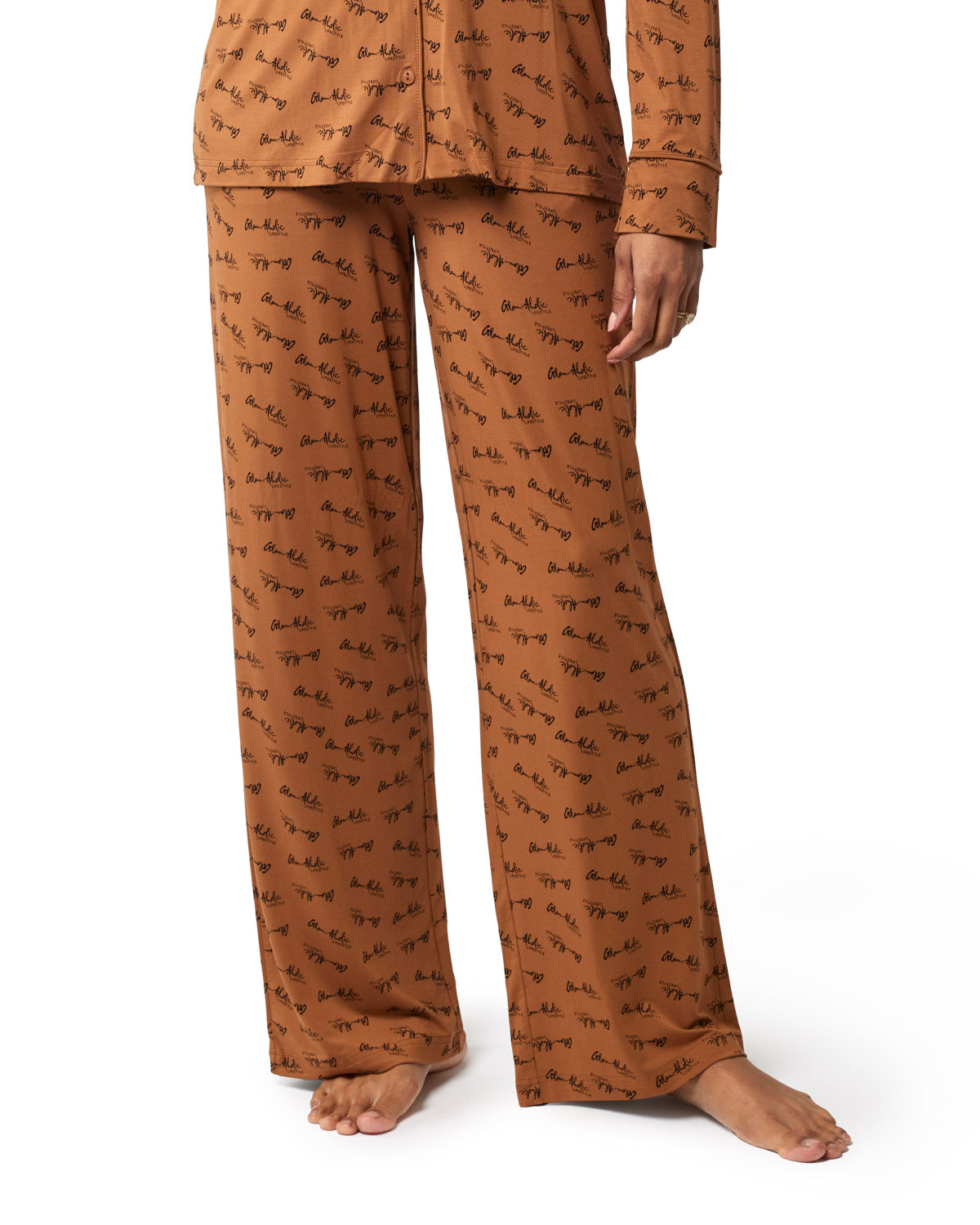 Brown signature pajamas featuring a stylish print, designed for comfort and relaxation in a chic, affordable style.